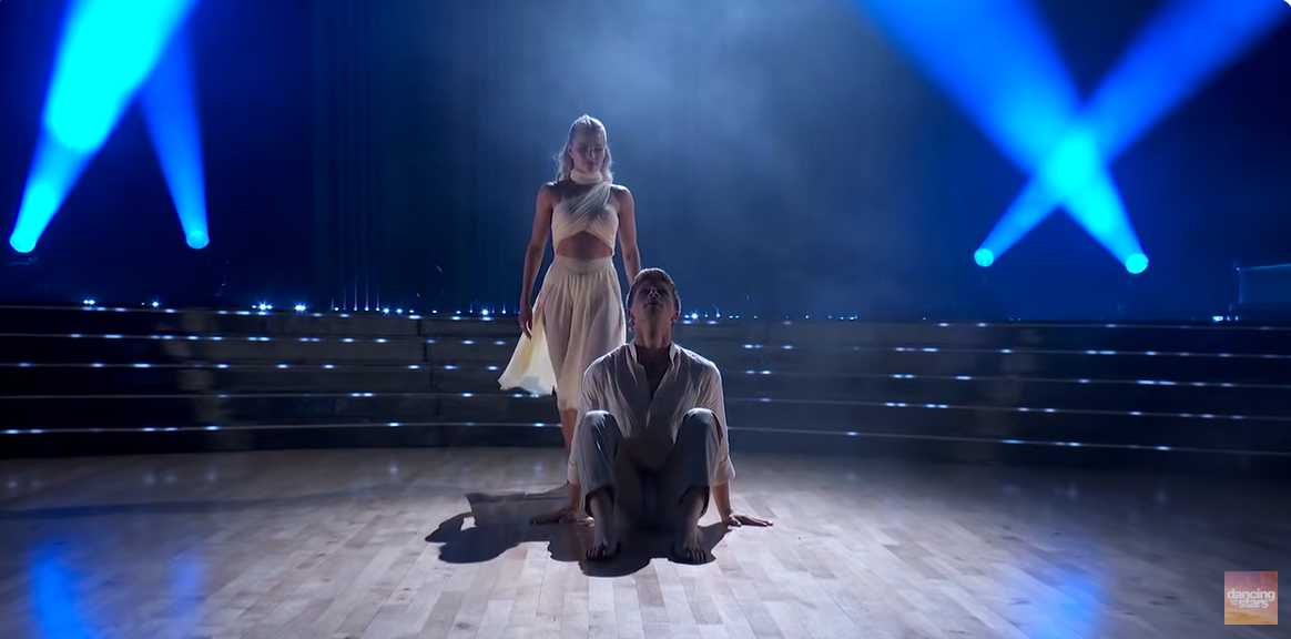 Witney Carson walks towards Robert Irwin as they begin their dance, as seen in a video post dated October 15, 2025 | Source: YouTube/DancingWithTheStars