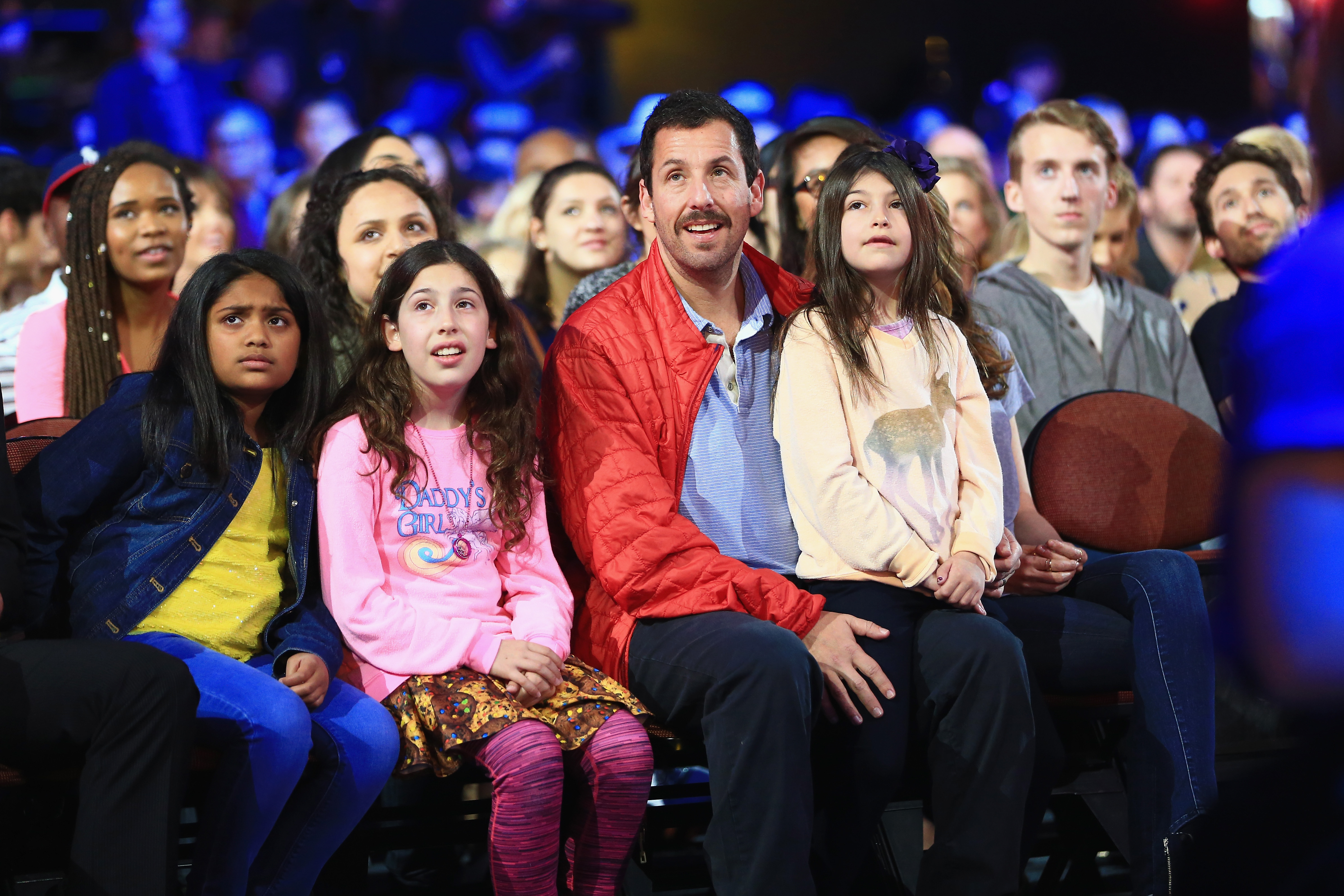 (L-R) Sadie Madison Sandler, actor Adam Sandler and Sunny Madeline Sandler attend Nickelodeon's 2016 Kids' Choice Awards at The Forum, on March 12, 2016 in Inglewood, California. | Source: Getty Images