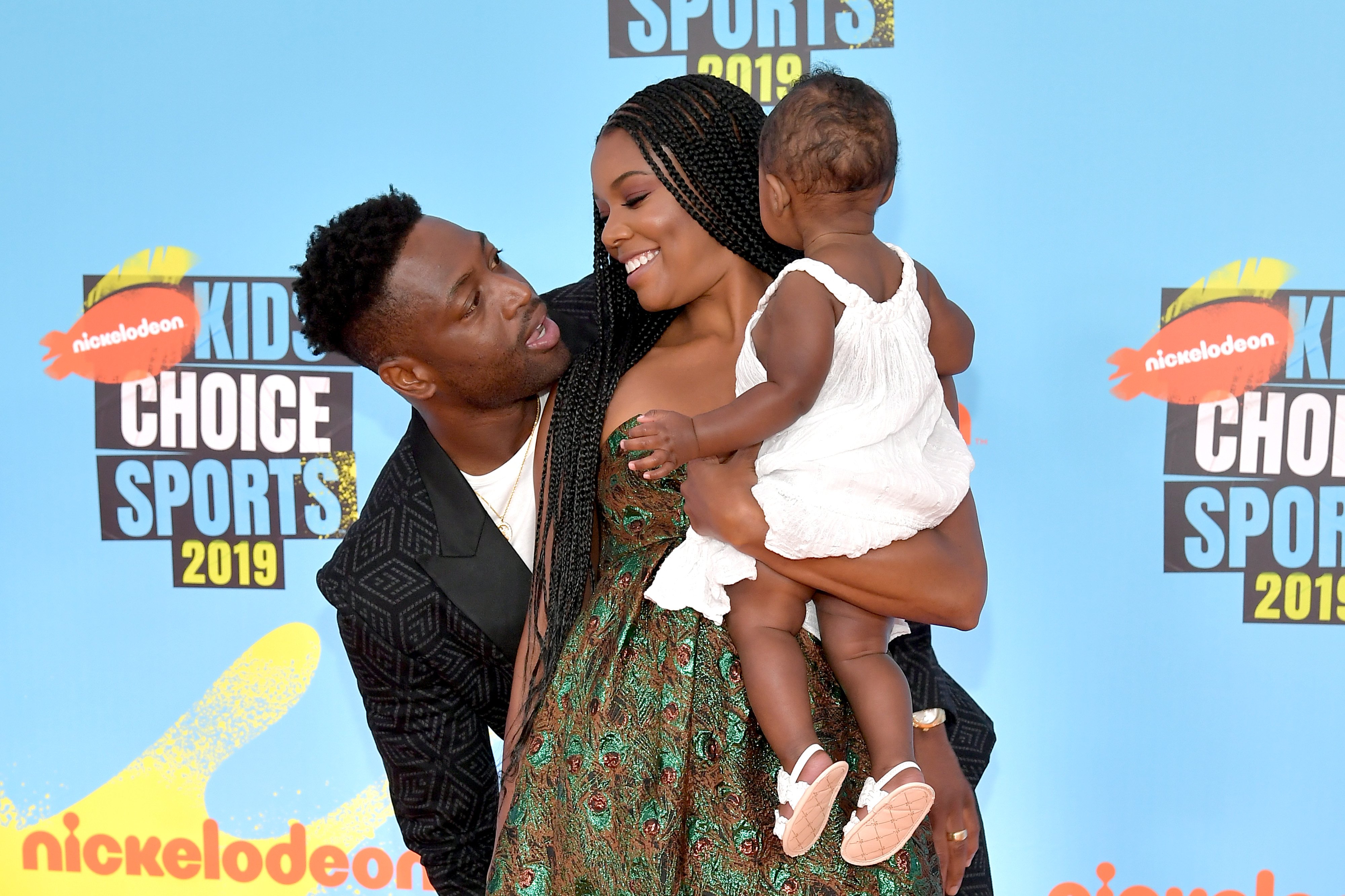 Dwyane Wade, Gabrielle Union, and Kaavia James Union Wade attend Nickelodeon Kids' Choice Sports 2019 at Barker Hangar on July 11, 2019 in Santa Monica, California. | Source: Getty Images