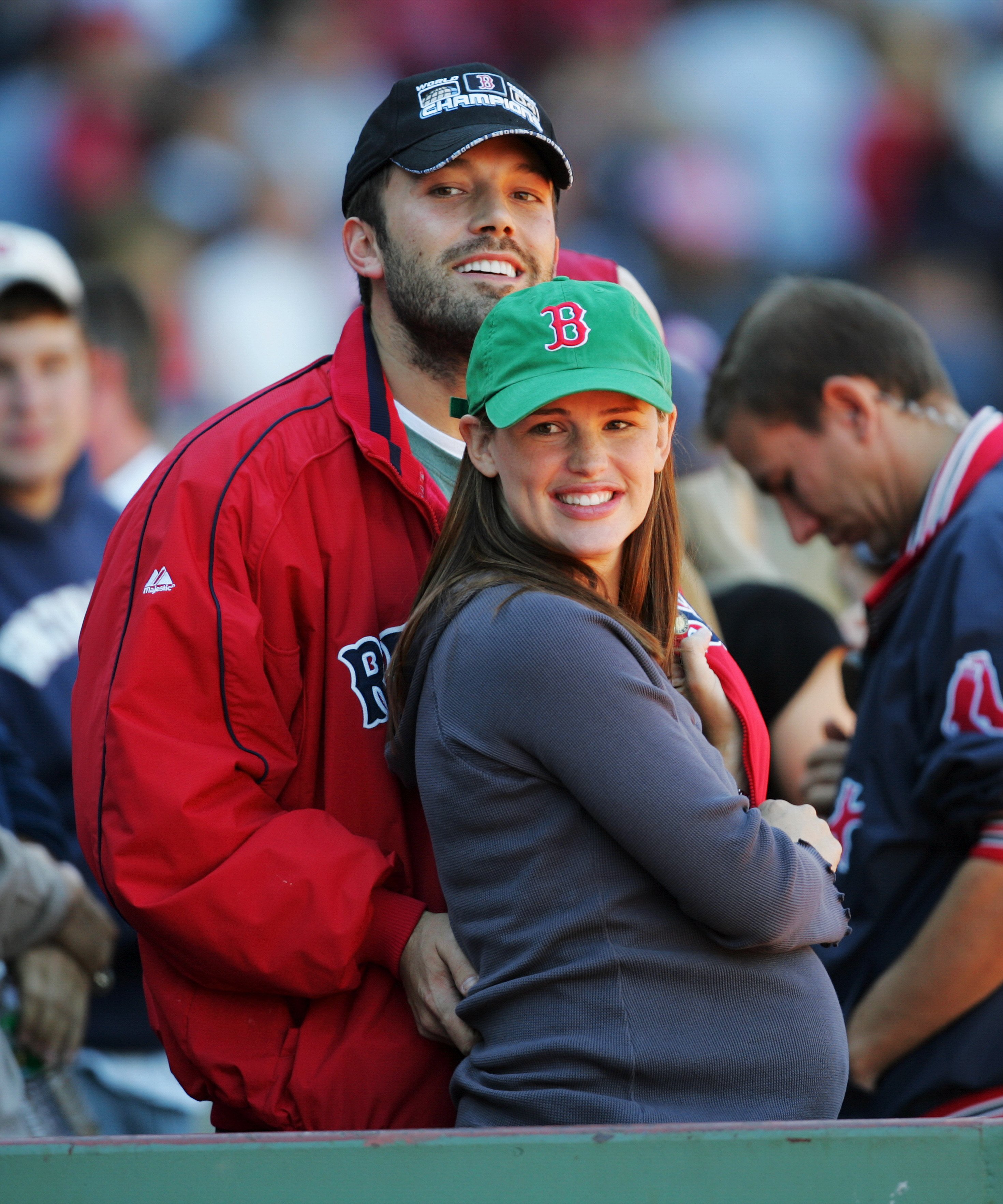 Ben Affleck and wife Jennifer Garner, who's expecting their first child, are on hand to cheer on the Boston Red Sox during a game against the New York Yankees at Fenway Park. October 2005 | Source: Getty Images 