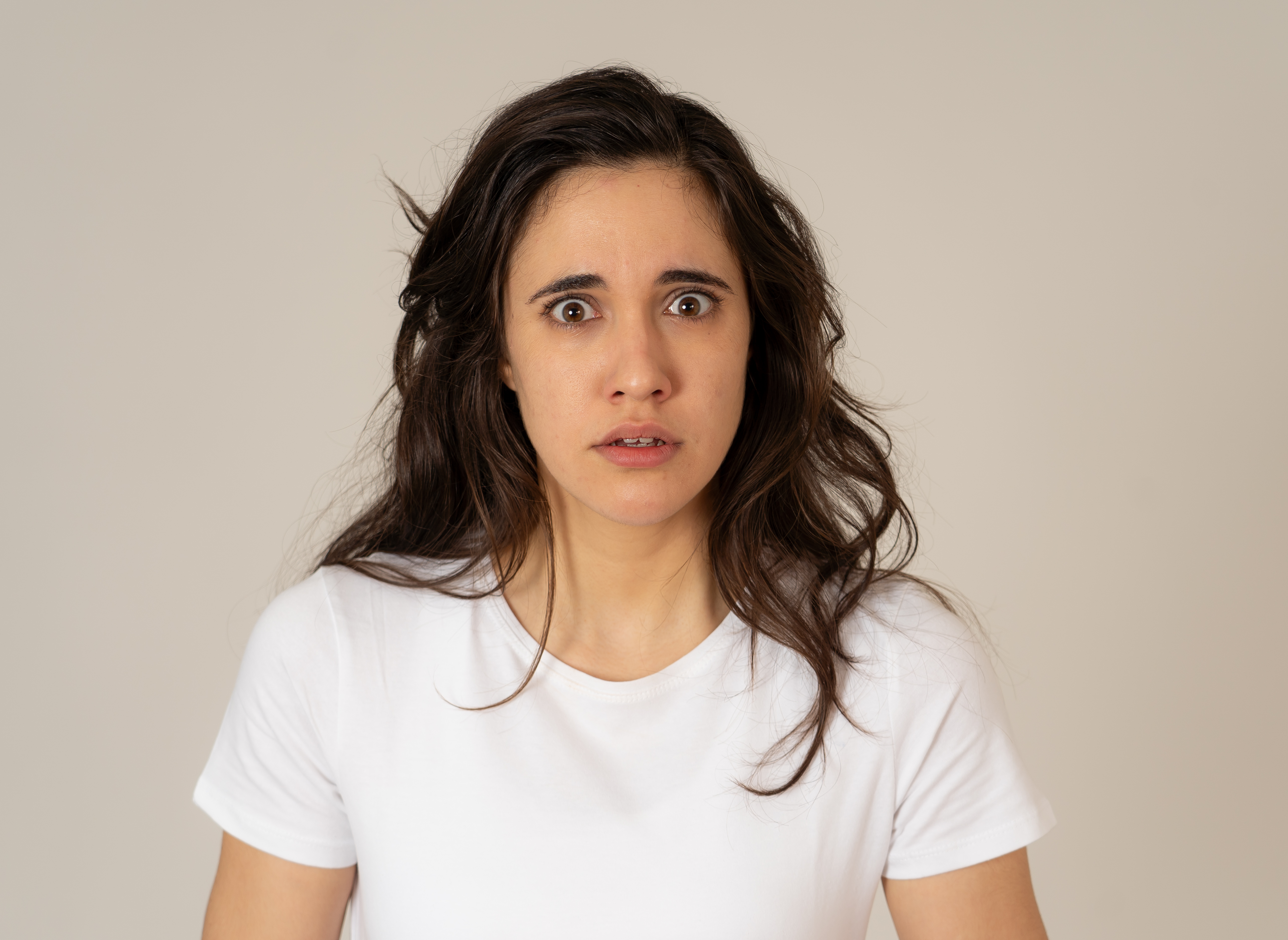 Woman with an expression of shock and confusion | Source: Shutterstock