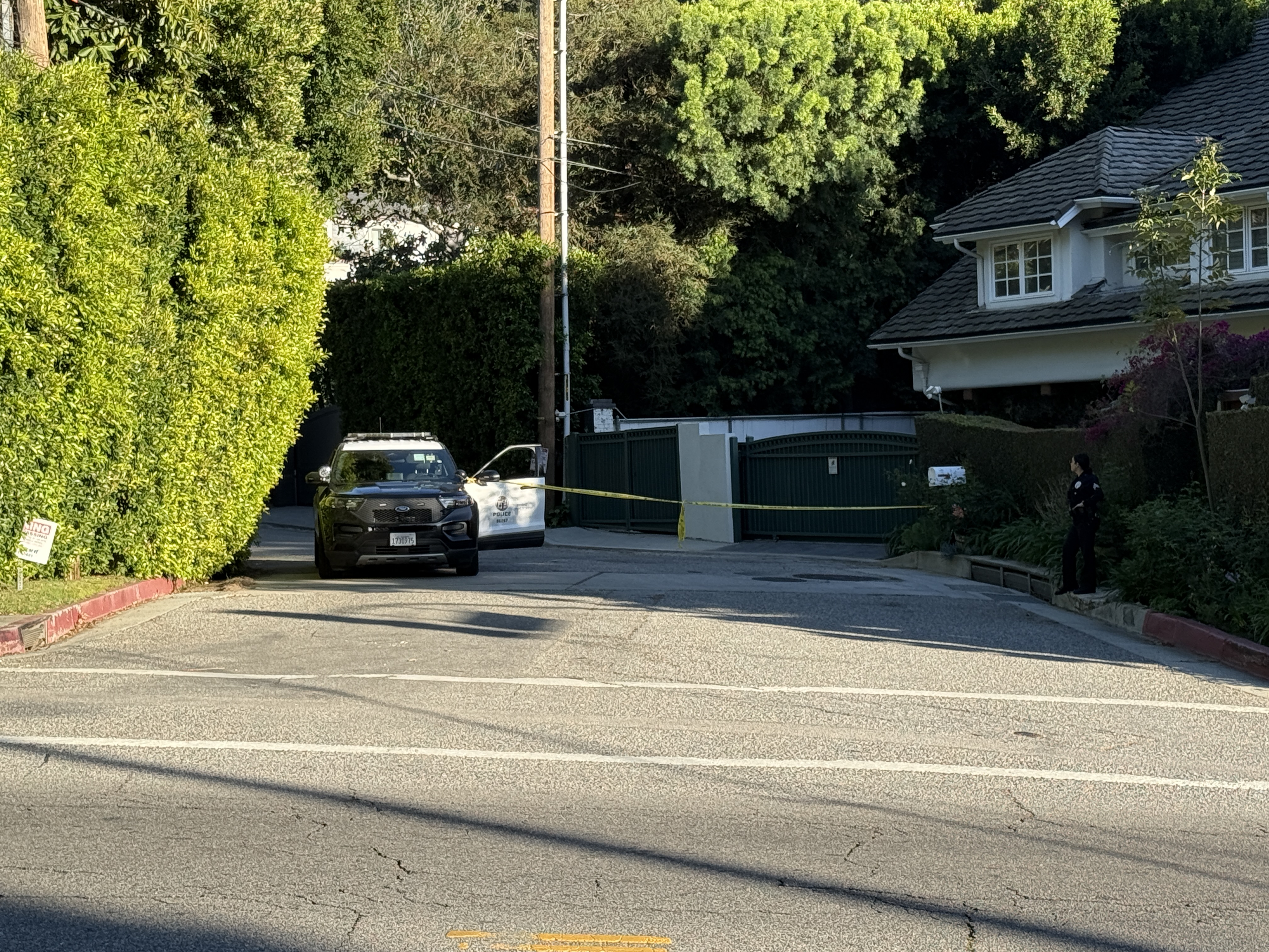 Police are seen outside Rihanna's home after a report of gunshots on March 08, 2026 in Beverly Hills, California | Source: Getty Images