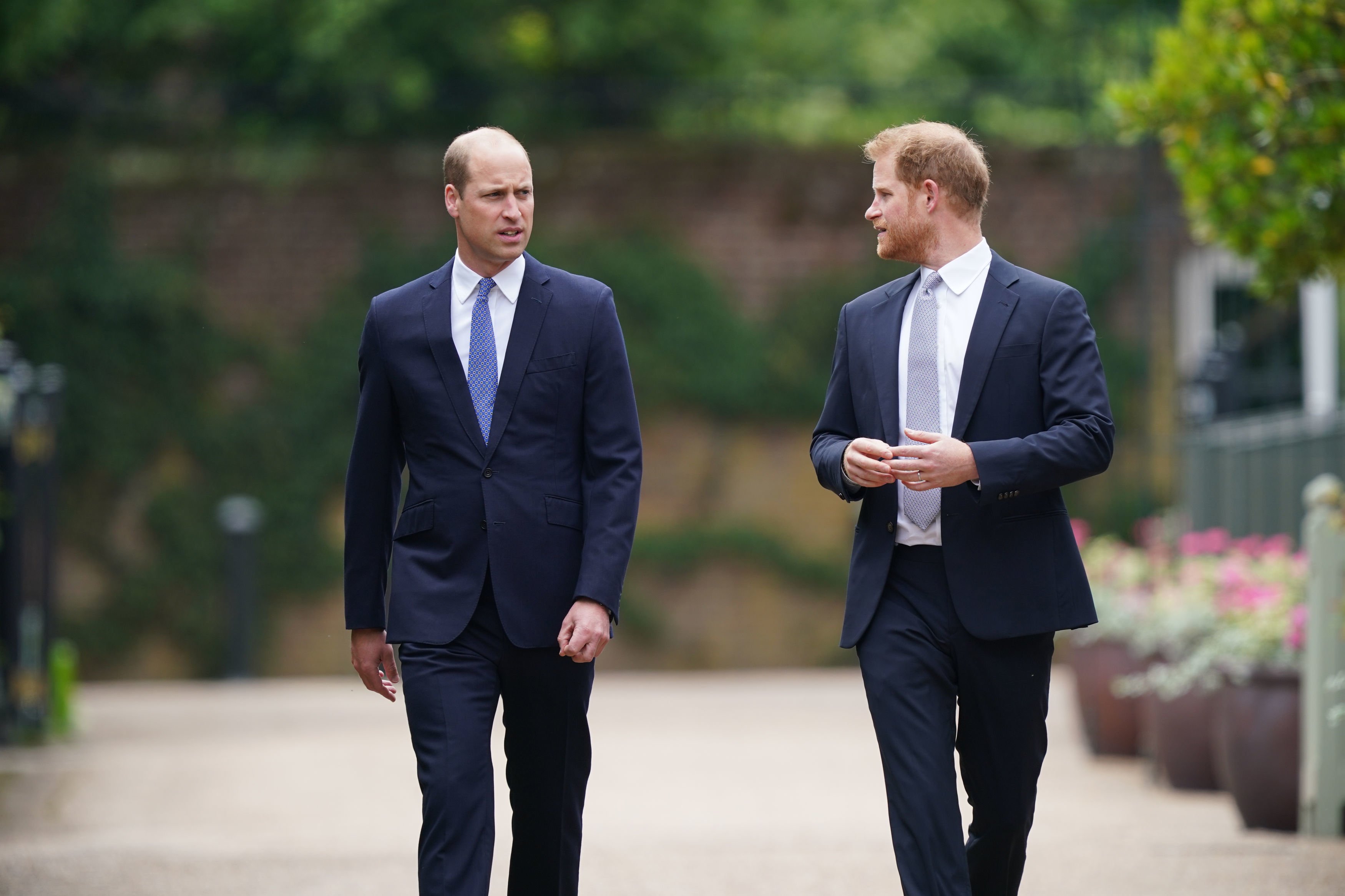Prince William, Duke of Cambridge and Prince Harry, Duke of Sussex arrive for the unveiling of a statue they commissioned of their mother Diana, Princess of Wales, in the Sunken Garden at Kensington Palace. | Source: Getty Images