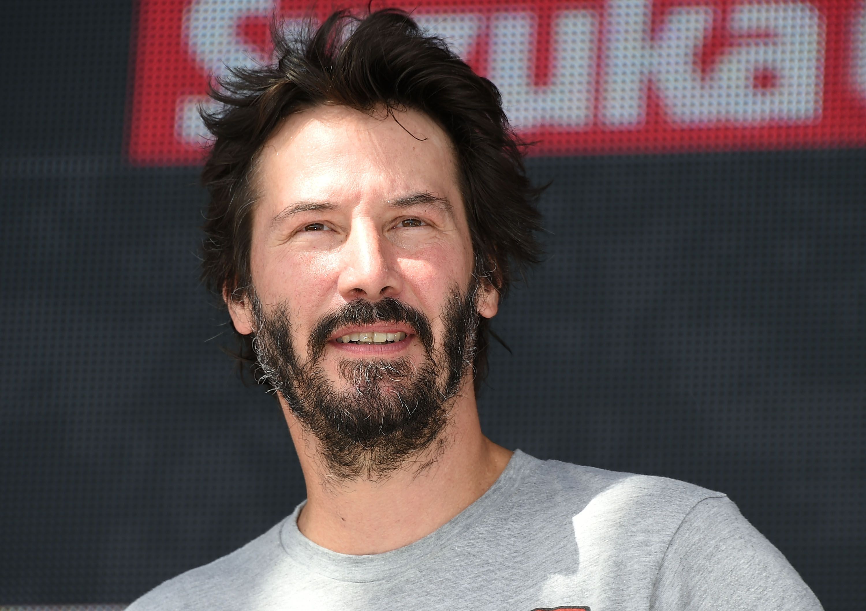 Keanu Reeves during the talk session during the Suzuka 8 Hours at the Suzuka Circuit on July 26, 2015 in Suzuka, Japan. | Source: Getty Images