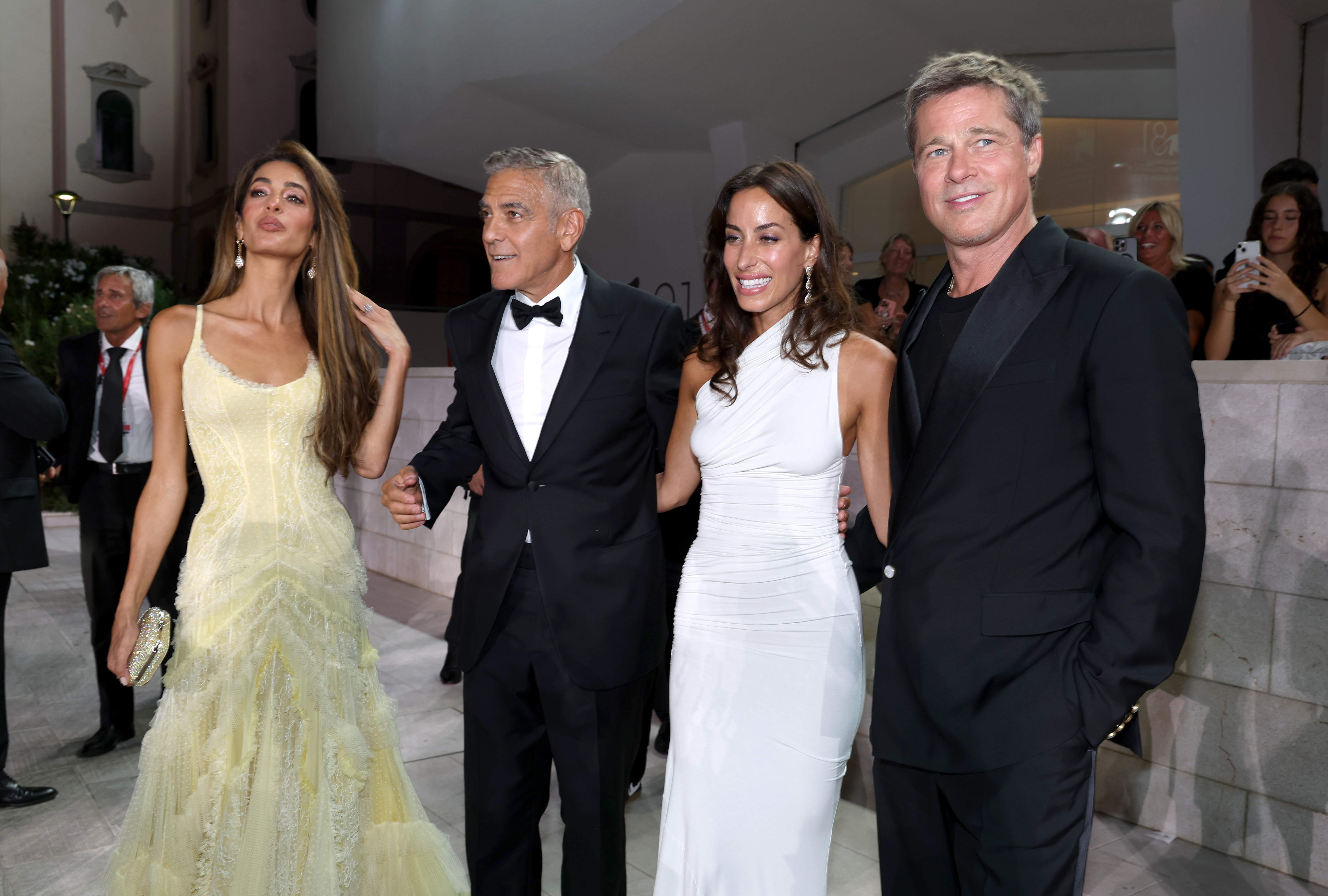 Amal Clooney, George Clooney, Ines de Ramon, and Brad Pitt attend the 