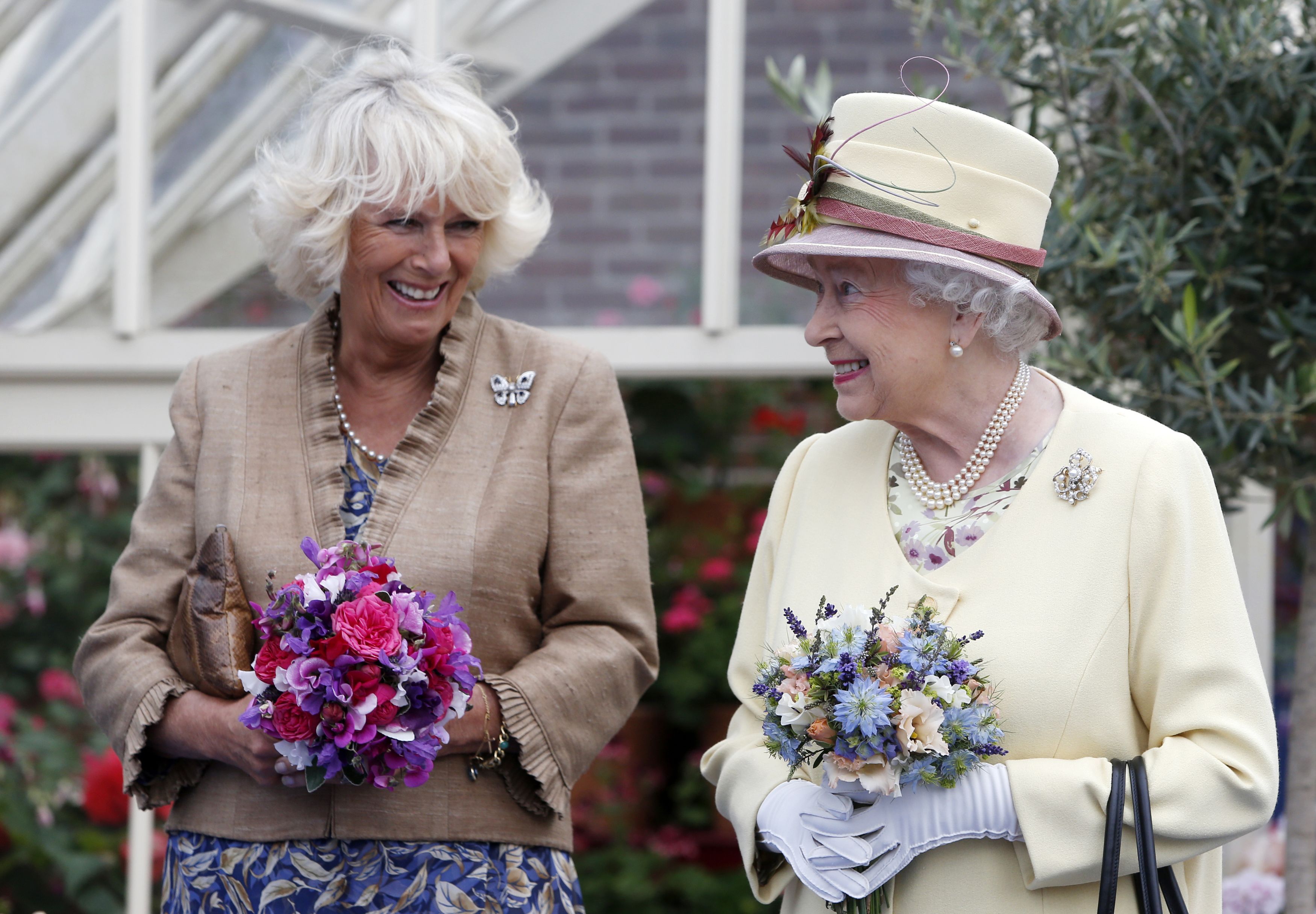 Queen Elizabeth II and Queen Consort in Cumnock 2014. | Source: Getty Images 