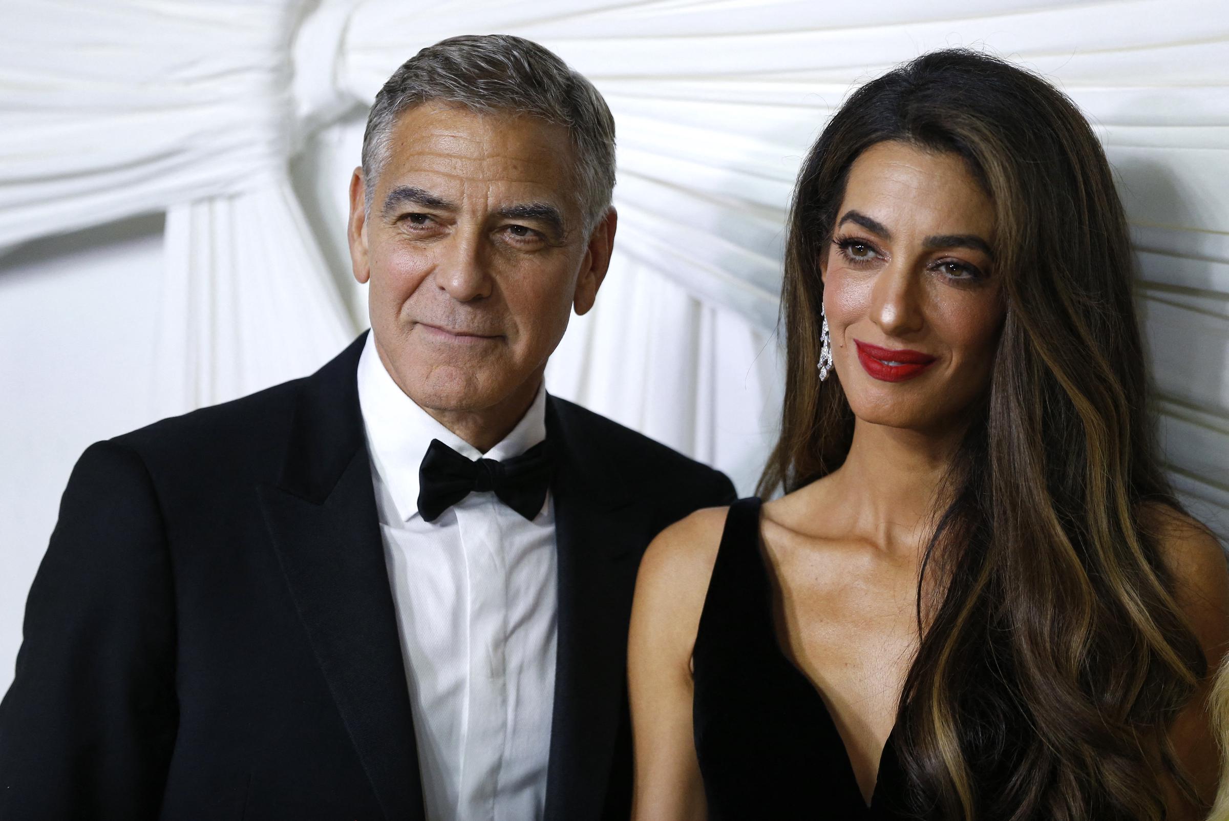 George and Amal Clooney arrive for "The Albies" hosted by the Clooney Foundation for Justice at the New York Public Library in New York, on September 26, 2024 | Source: Getty Images