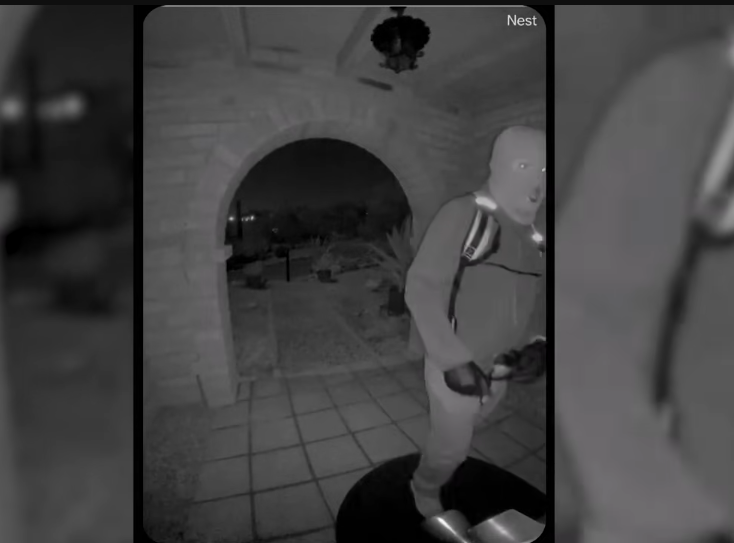 A masked individual on Nancy Guthrie's front porch, from a video dated February 10, 2026 | Source: YouTube/USA Today