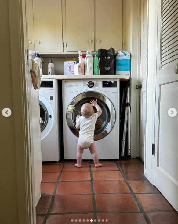 Ireland Baldwin's daughter exploring the laundry room in a post dated May 12, 2024 | Source: Instagram/irelandirelandireland