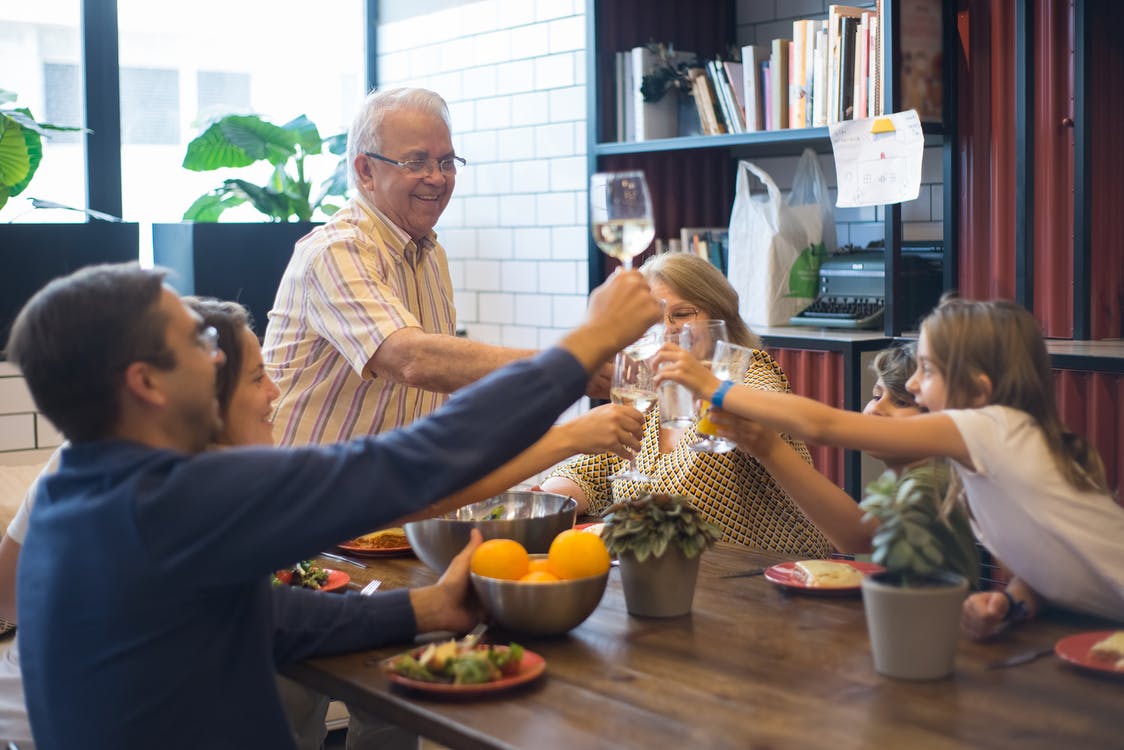 Man spending time with his children and grandchildren. | Photo: Pexels