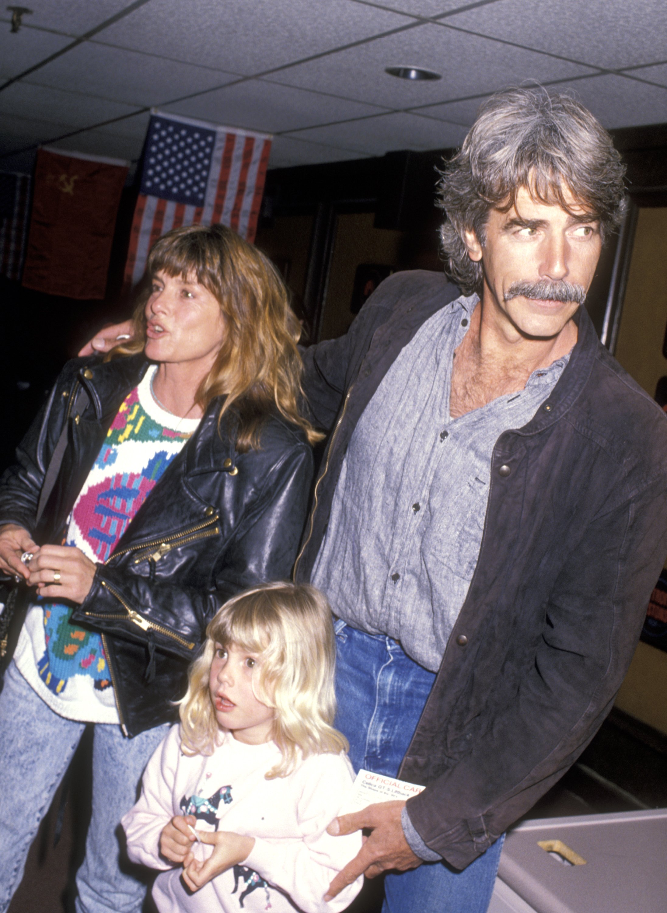  Aktörler Katharine Ross, Sam Elliott ve kızı Cleo Elliott katıldı. "Moskova Sirki Açılışı" Mart 1990'da Inglewood, California'daki Great Western Forum'da |  Kaynak: Getty Images