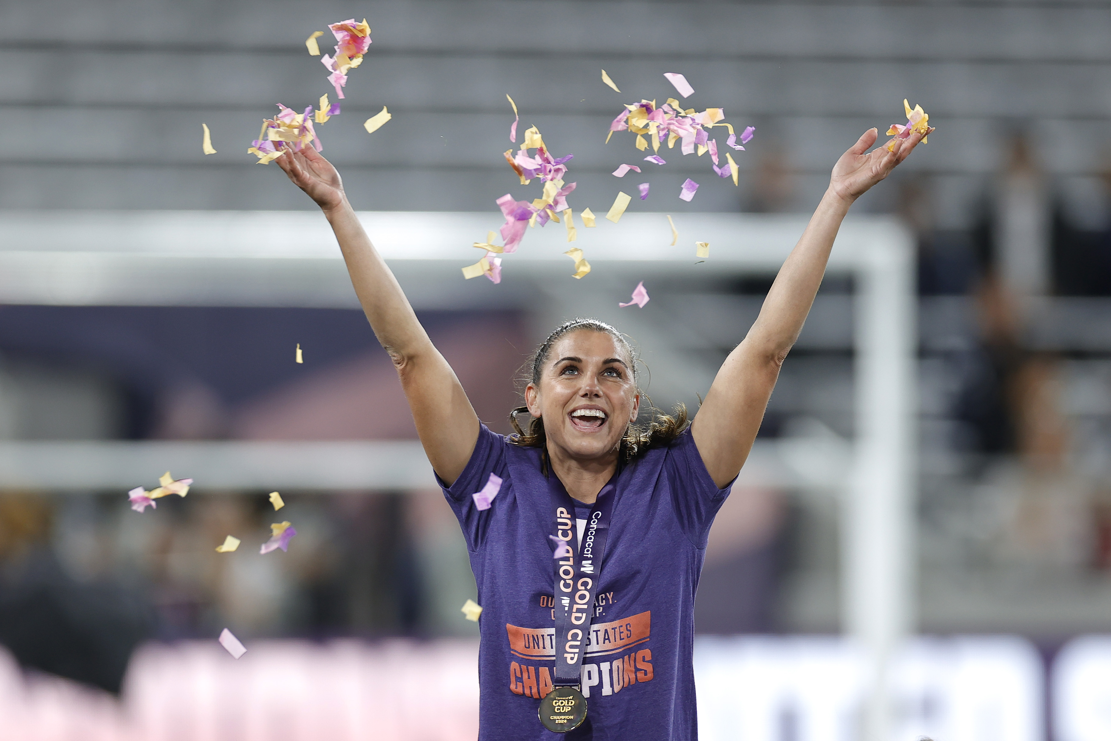 Alex Morgan tosses confetti in the air after defeating Brazil during the 2024 Concacaf W Gold Cup final in San Diego, California, on March 10, 2024. | Source: Getty Images