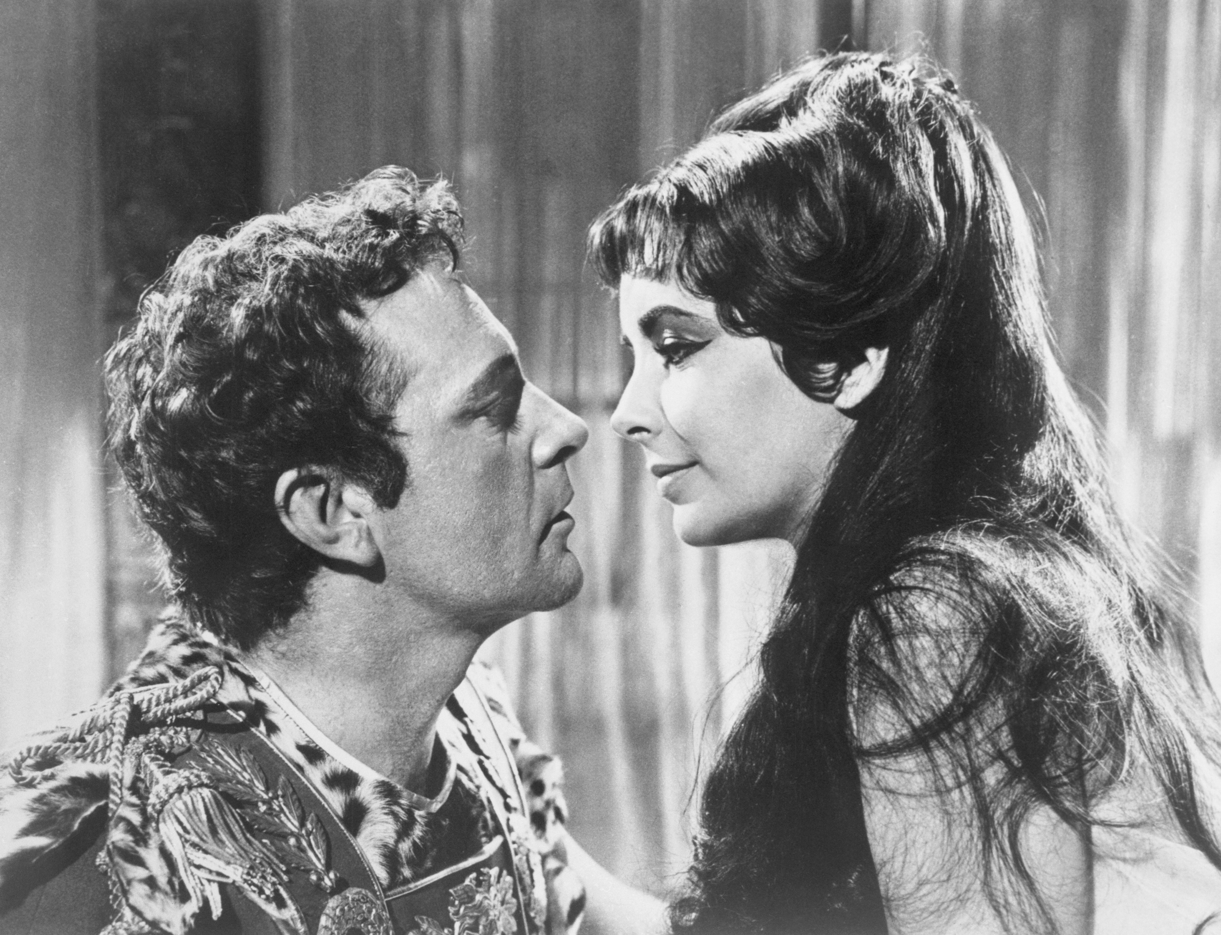 Mark Anthony (Richard Burton) admits his love for Cleopatra (Elizabeth Taylor) in film, Cleopatra. | Source: Getty Images