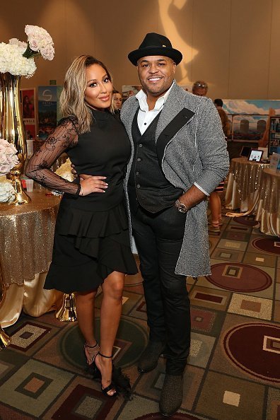 Adrienne Bailon and Israel Houghton attend the Daytime Emmy Awards on May 4, 2019 | Photo: Getty Images