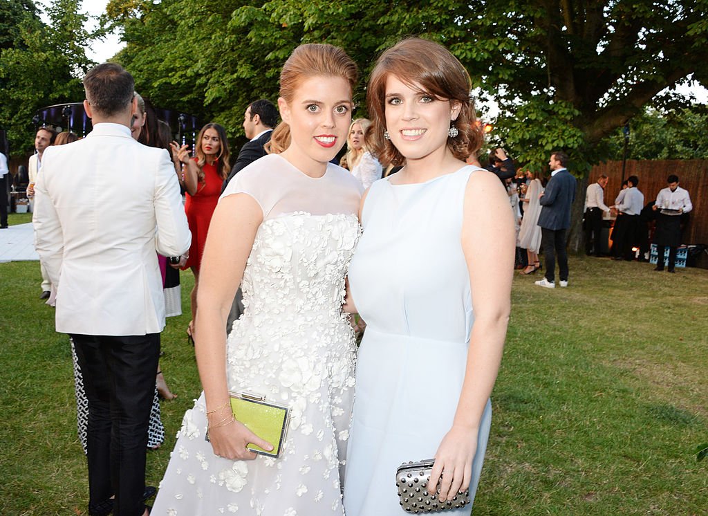 Prince Eugenie and Prince Beatrice pictured at the Serpentine Gallery Summer Party co-hosted by Brioni, 2014, London, England. | Photo: Getty Images