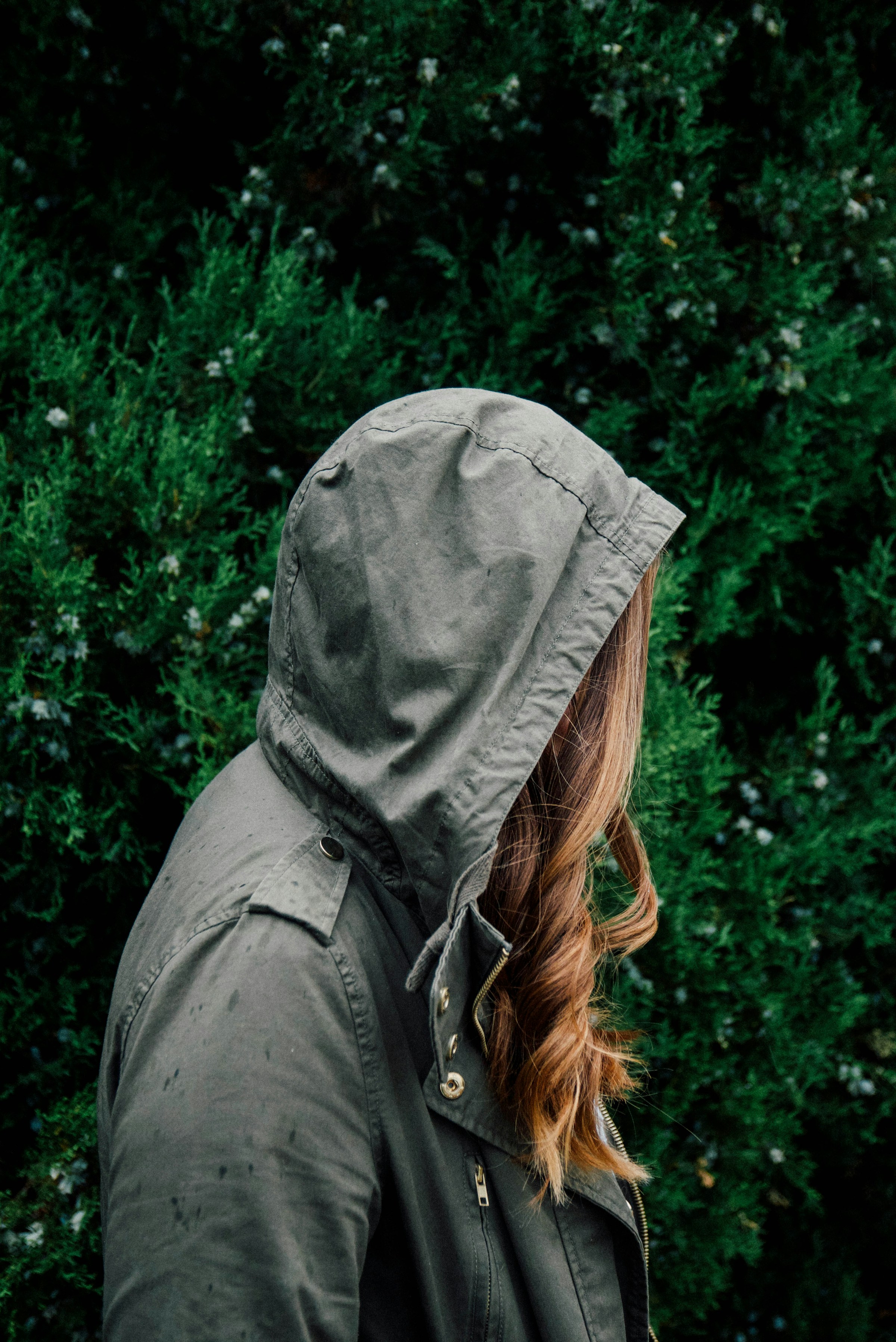 A woman hiding her face | Source: Unsplash