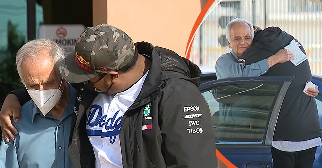 Ein Mann umarmt seinen ehemaligen Schüler, der ihm geholfen hat, Geld zu sammeln, nachdem er gesehen hat, dass er in seinem Auto wohnt | Quelle: Youtube/FOX 11 Los Angeles