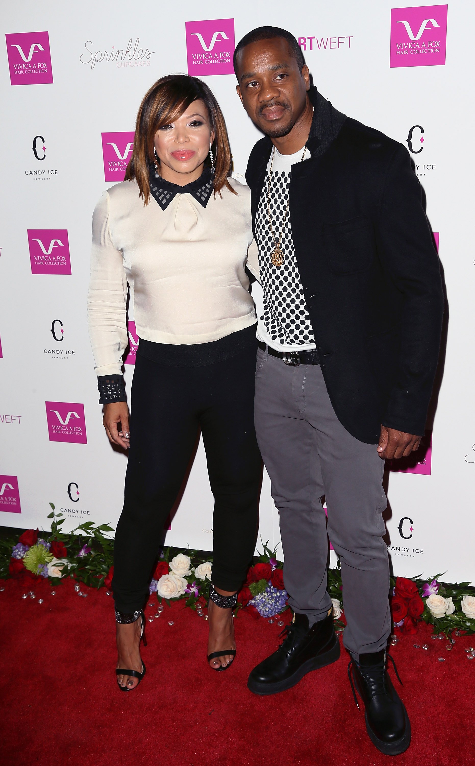 Tisha Campbell & Duane Martin at Vivica A. Fox’s 50th birthday celebration on Aug. 2, 2014 in California | Photo: Getty Images