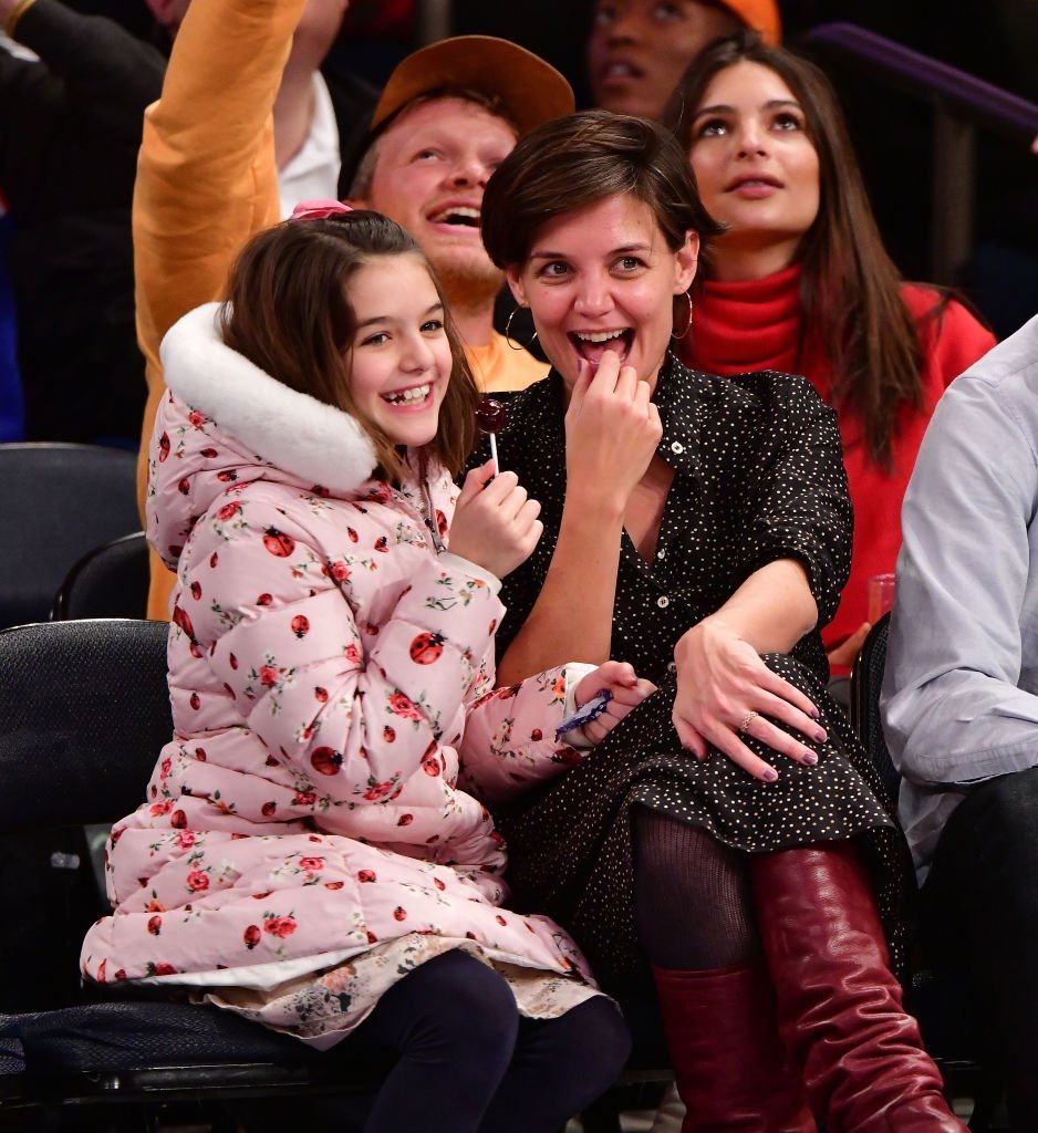 Suri Cruise and Katie Holmes attend the Oklahoma City Thunder Vs New York Knicks game at Madison Square Garden. | Photo: Getty Images
