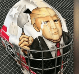 Mask Picturing Donald Trump building brick wall | Photo: YouTube/ smokaj0000