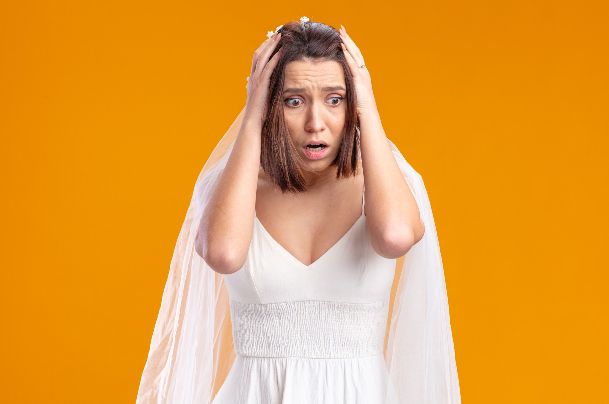 A shocked and upset bride | Source: Freepik