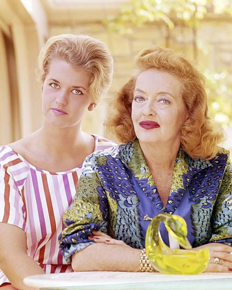 Bette Davis (1908 - 1989) with her daughter Barbara Davis Sherry (later known as B.D. Hyman), circa 1965. | Source: Getty Images