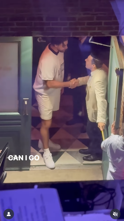 Travis Kelce is photographed shaking hands with someone as he and Taylor Swift leave the Michelin-starred restaurant, Rossi, in New York City, dated June 21, 2025 | Source: Instagram/javanjoslin