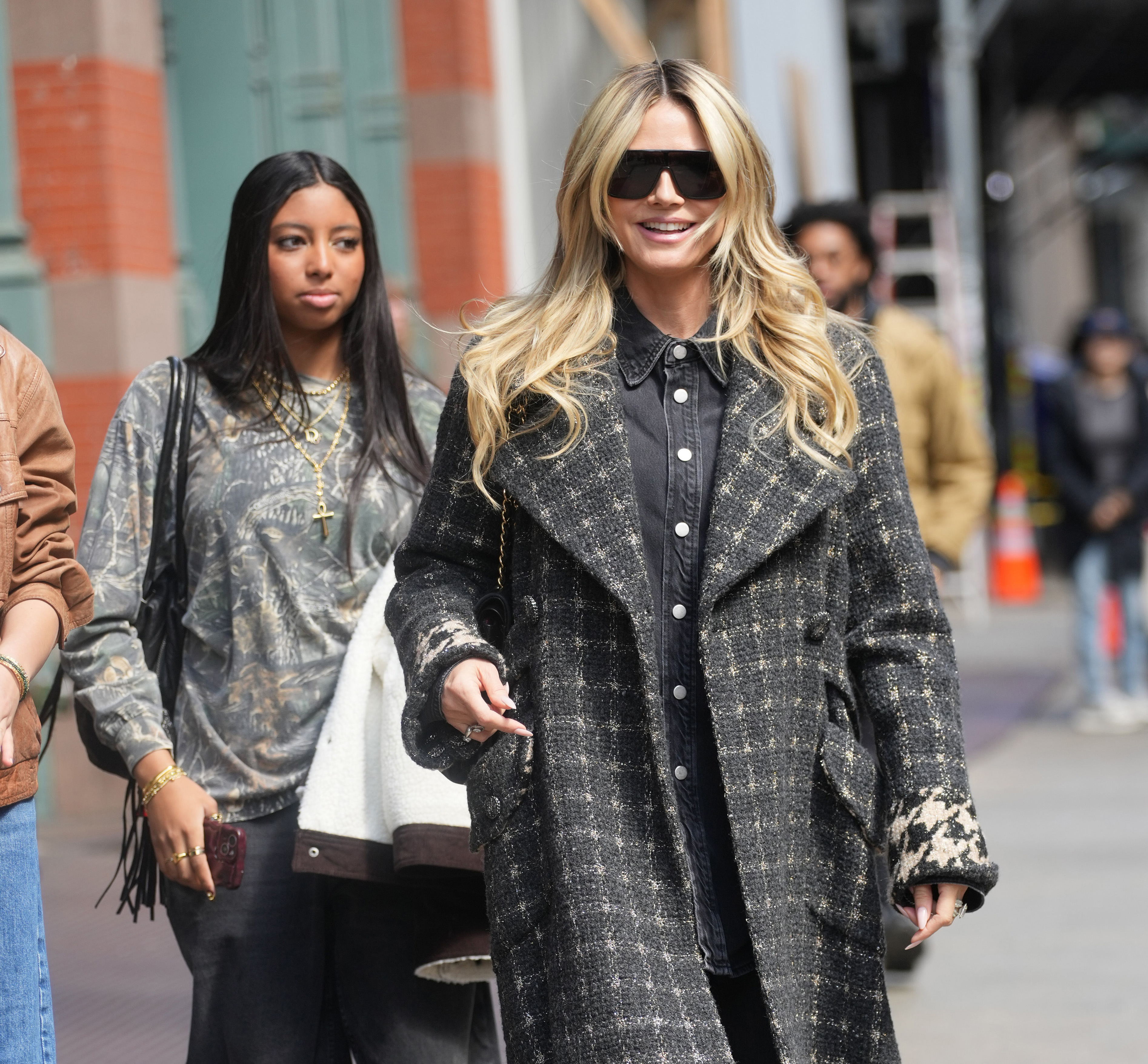 Lou Samuel and Heidi Klum seen on March 26, 2025, in New York. | Source: Getty Images