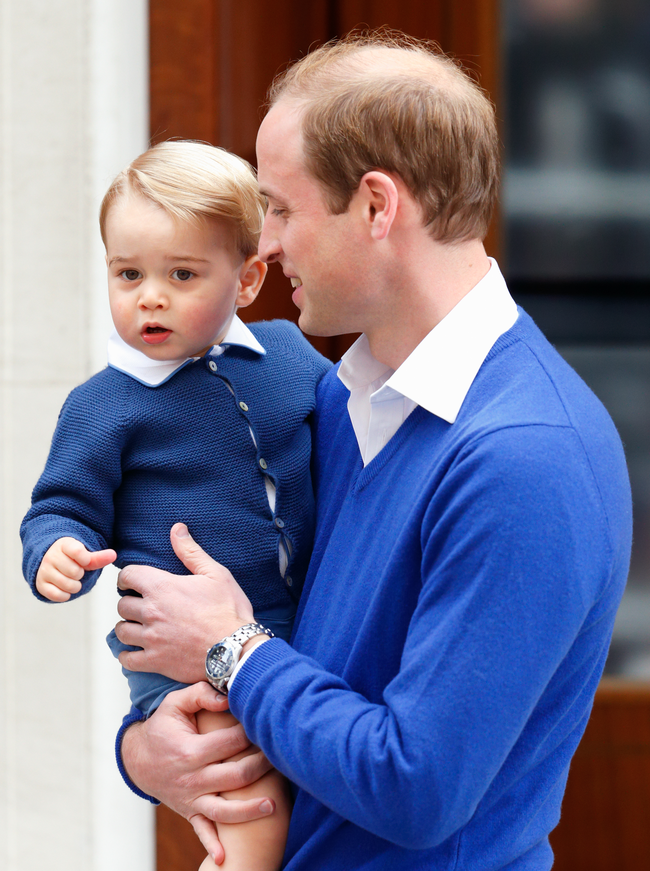 Prince George and Prince William arrive at the Lindo Wing after Princess Catherine gave birth to Princess Charlotte at St Mary's Hospital in London, England on May 2, 2015 | Source: Getty Images
