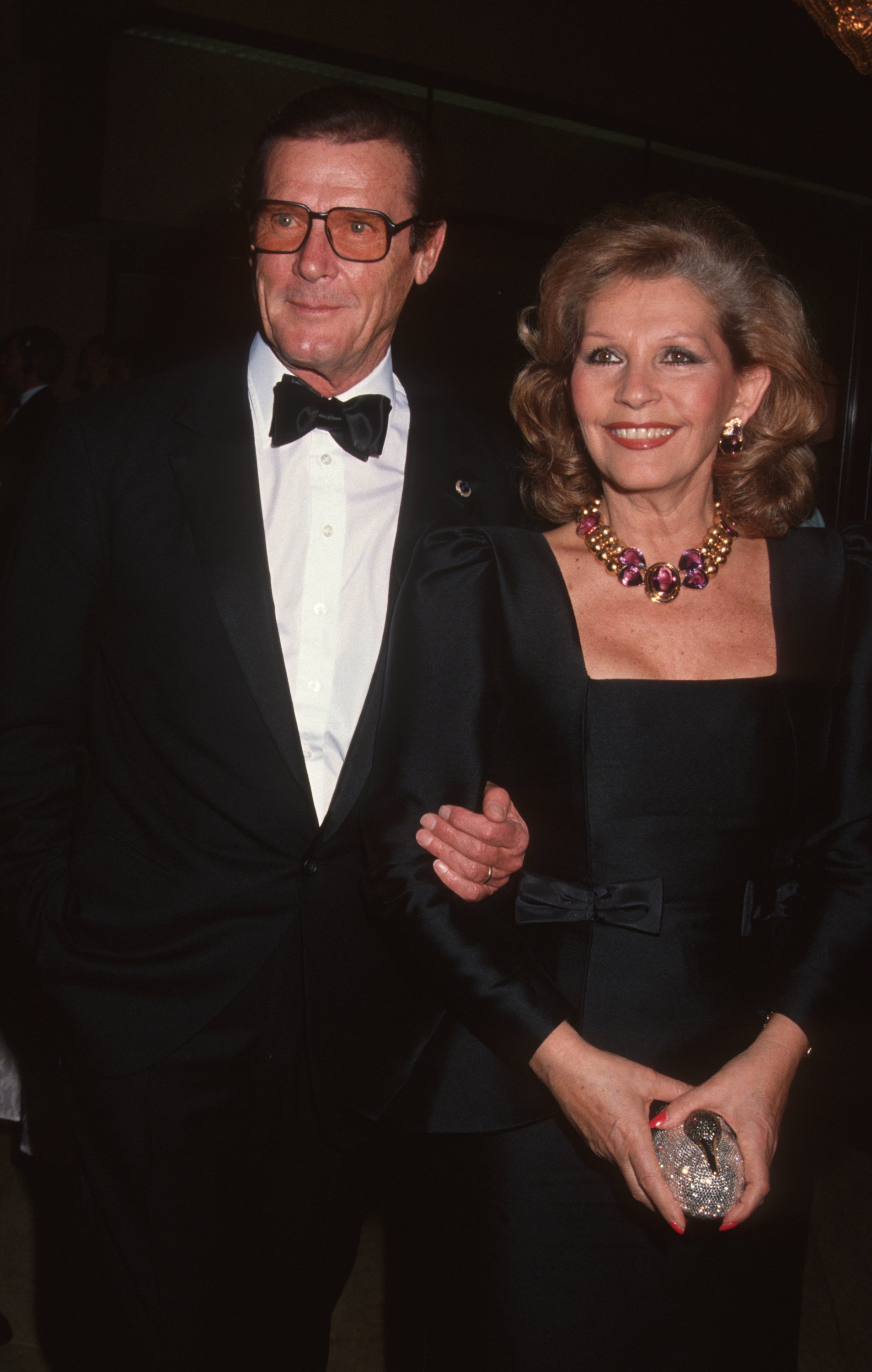 Roger Moore and Luisa Moore during AFI Life Achievement Award Honoring Sidney Poitier on March 12, 1992 at Beverly Hilton Hotel in Beverly Hills, California | Source: Getty Images