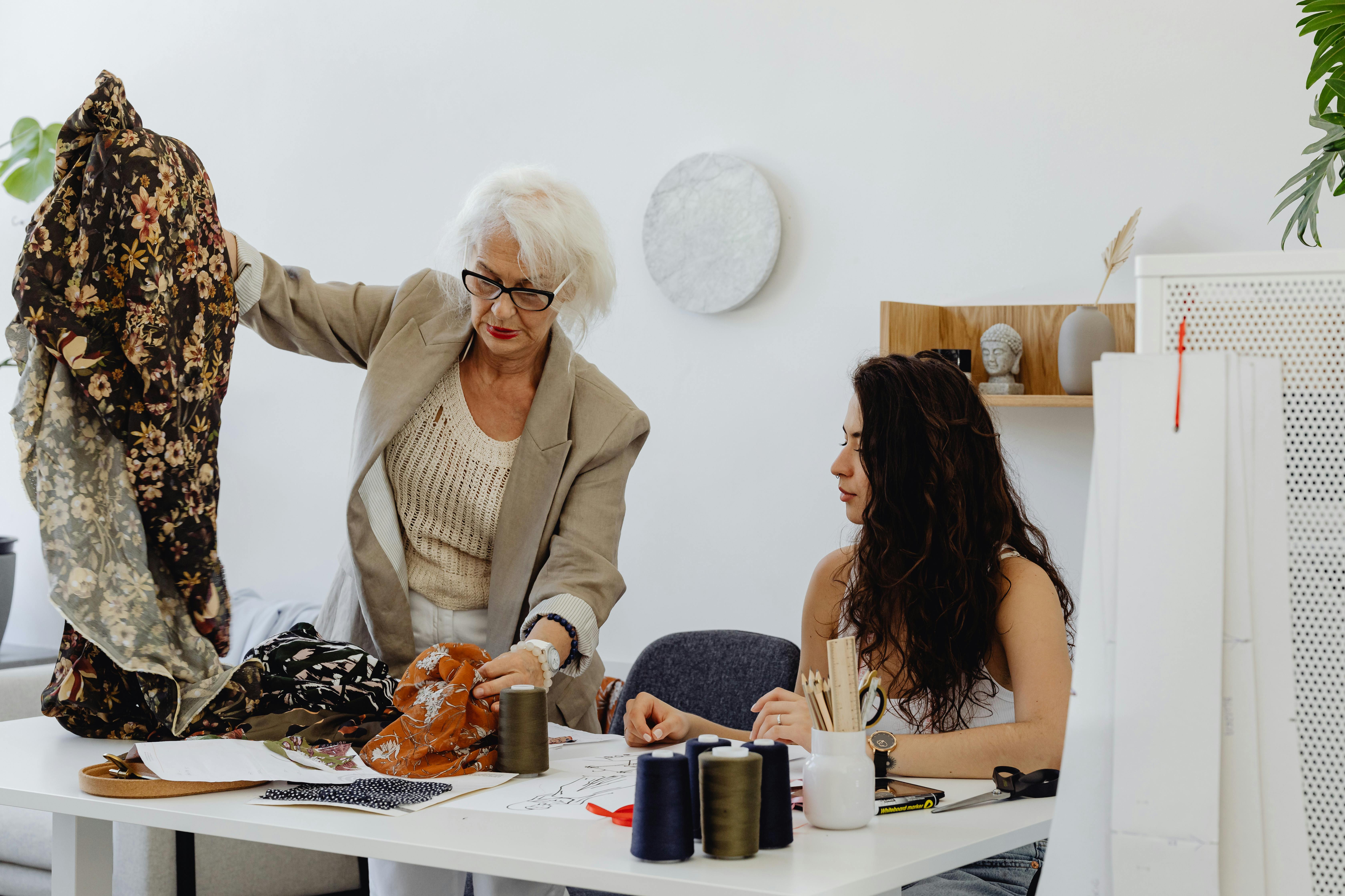 A woman busy with fabric | Source: Pexels