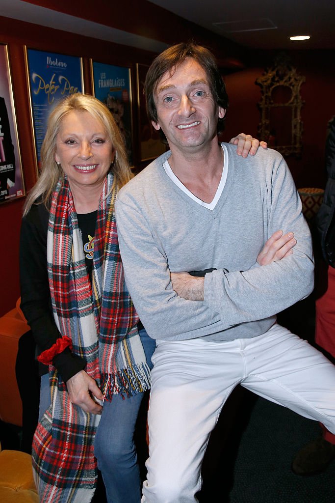 La chanteuse Véronique Sanson et l'humoriste Pierre Palmade le 12 avril 2016 à Paris, France. | Photo : Getty Images.