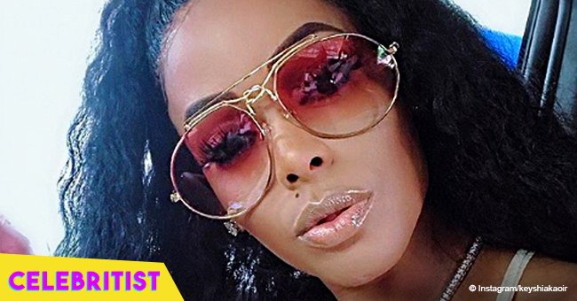 Keyshia Ka'oir flaunts enviable body in skimpy top & skin-tight pants while riding a jet ski