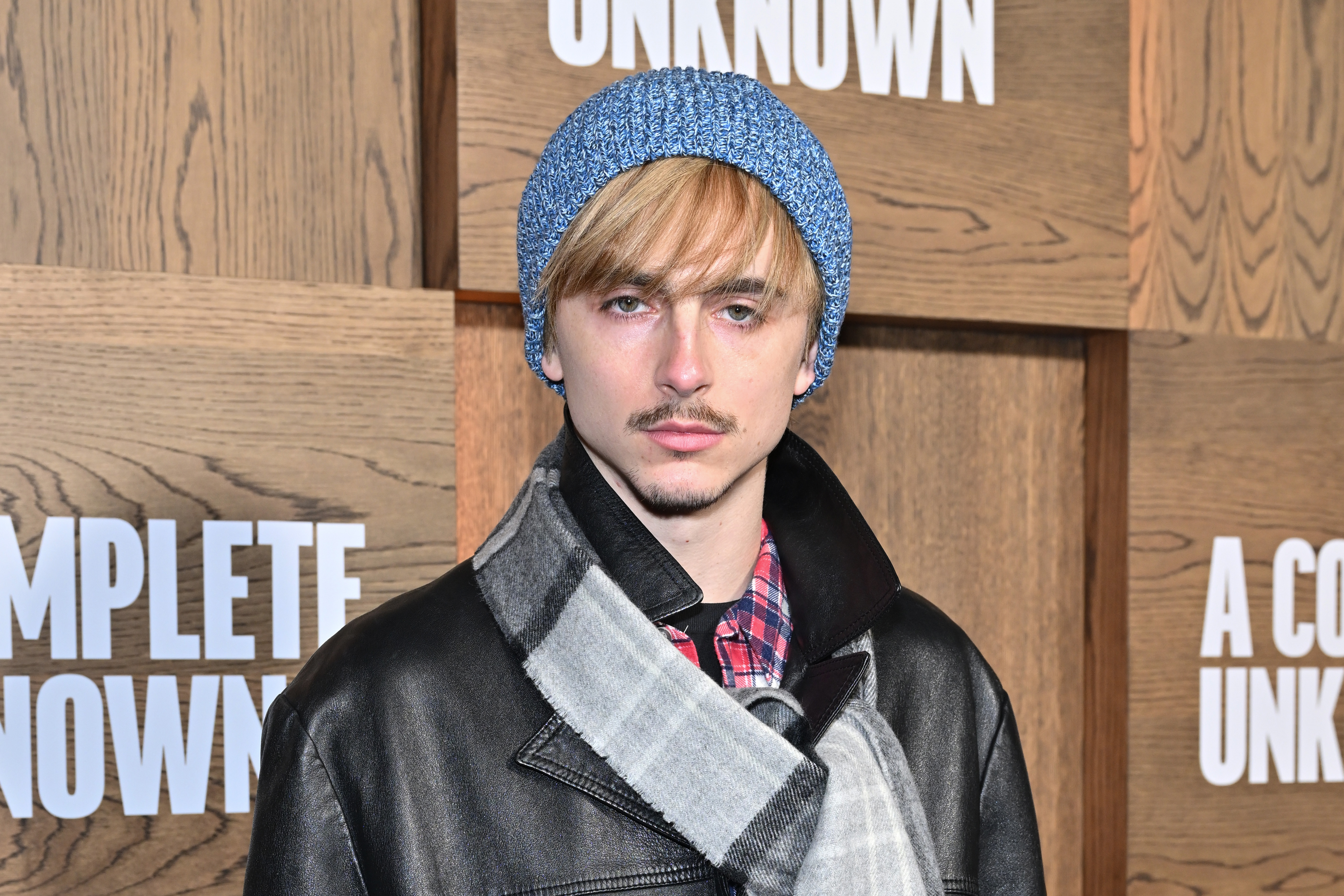 Two days later, Timothée Chalamet attended the premiere of Searchlight Pictures' "A Complete Unknown" at the SVA Theater on December 13, 2024, in New York City, debuting a completely different haircut. He wore blonde bangs, with the rest of his head covered by a blue knitted beanie.