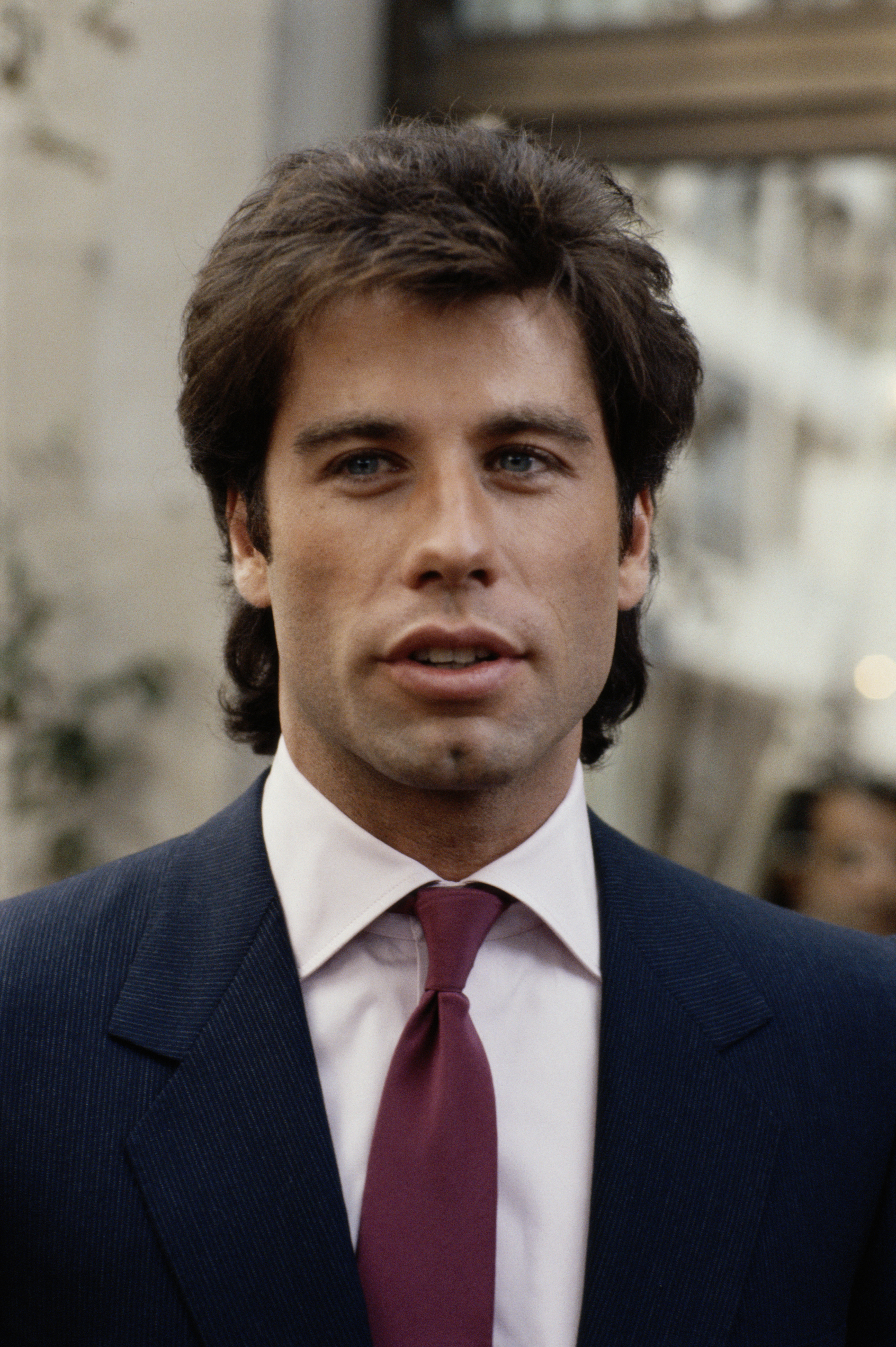 John Travolta during the promotion of his film "Staying Alive" in London, England in 1983 | Source: Getty Images