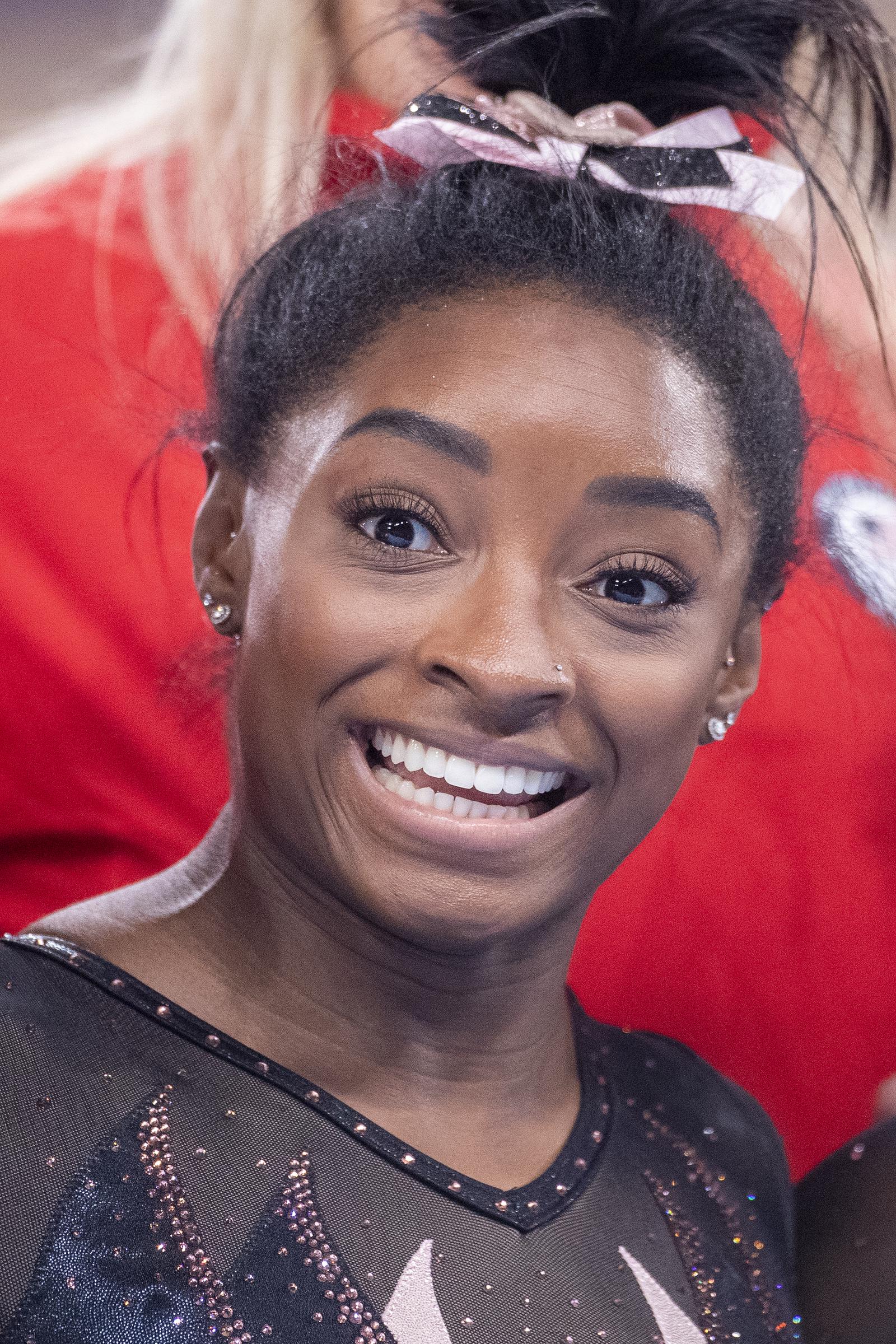 Simone Biles posing for photographs after the Artistic Gymnastics Podium Training in preparation for the Tokyo 2020 Olympic Games on July 22, 2021, in Tokyo, Japan | Source: Getty Images