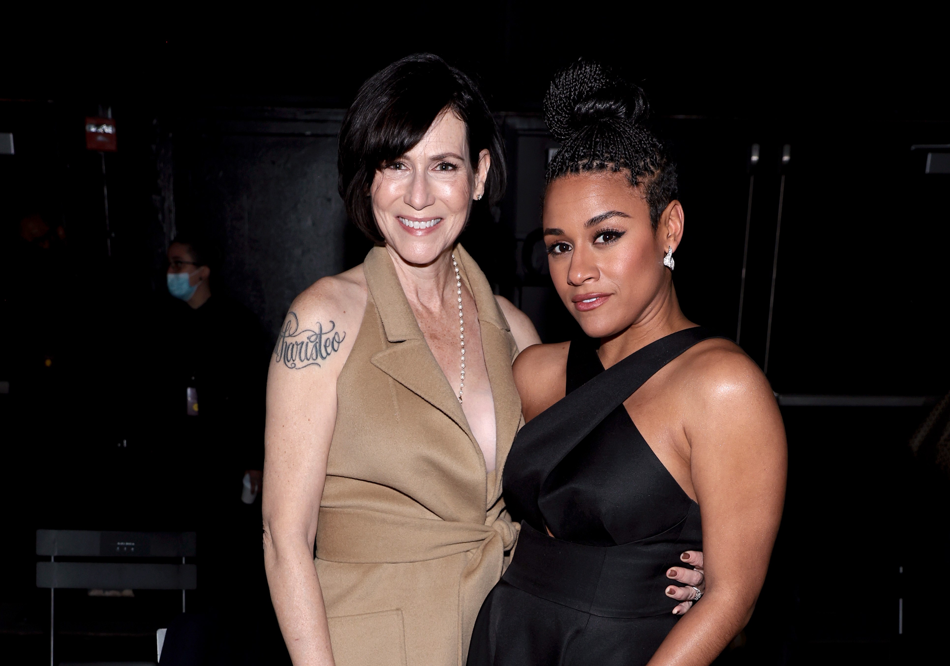 Sue Makkoo and Ariana DeBose attend the Michael Kors Collection Fall/Winter 2022 Runway Show at Terminal 5, on February 15, 2022, in New York City. | Source: Getty Images