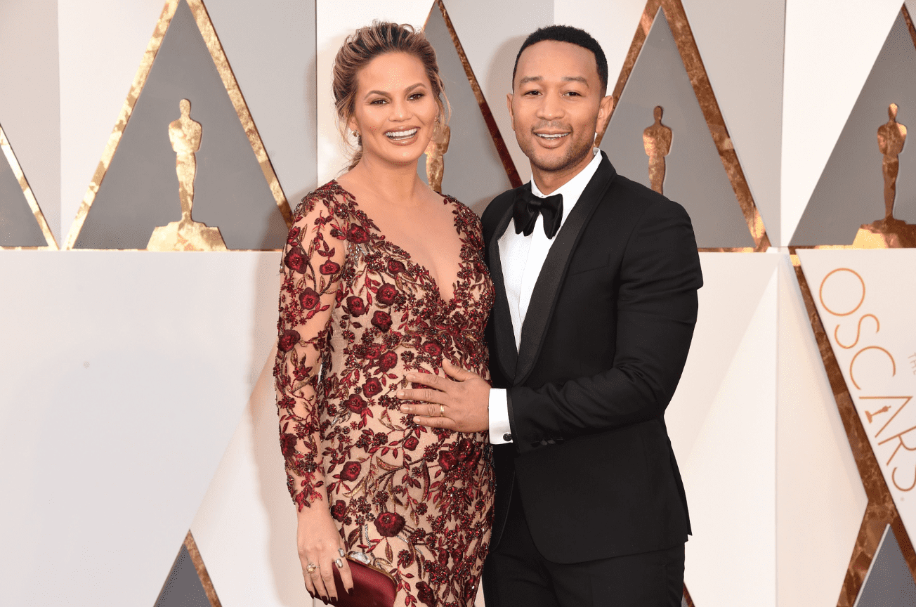 Chrissy Teigen and John Legend during the 88th Annual Academy Awards at Hollywood & Highland Center on February 28, 2016 in Hollywood, California. | Source: Getty Images