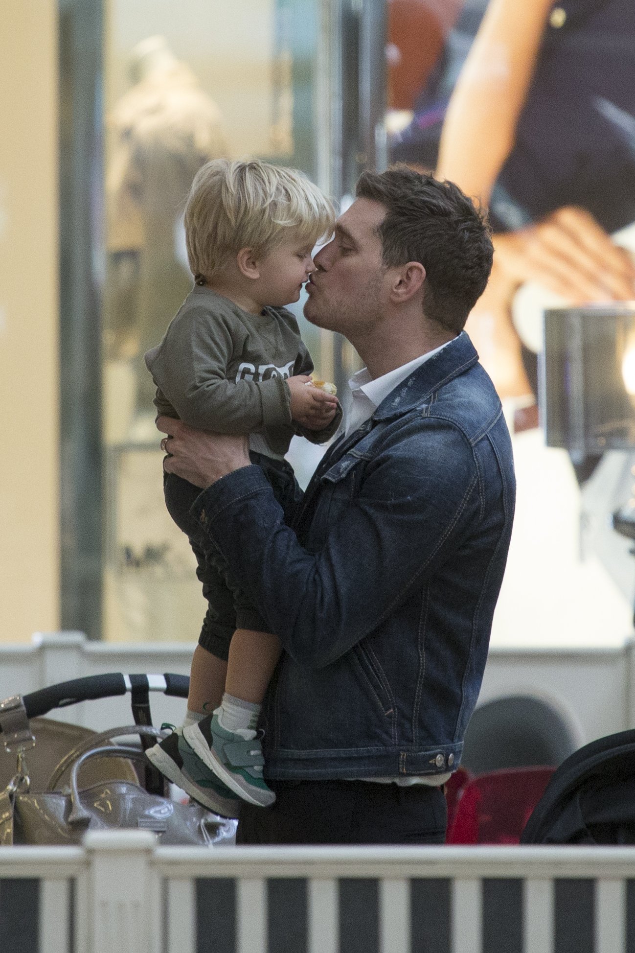 Michael Buble kissing his son Noah during a sighting on April 28, 2015, in Madrid, Spain. | Source: Iconic/GC Images/Getty Images