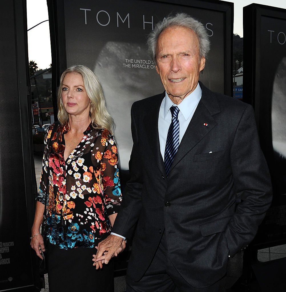 Clint Eastwood and Christina Sandera at the screening of "Sully" at Directors Guild Of America on September 8, 2016, in Los Angeles | Photo: Getty Images