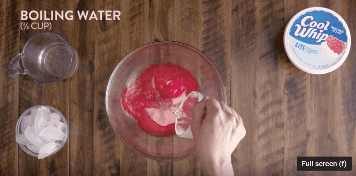 Add the boiling water, cold water and ice cubes. Image credit: YouTube/Kraft Recipes