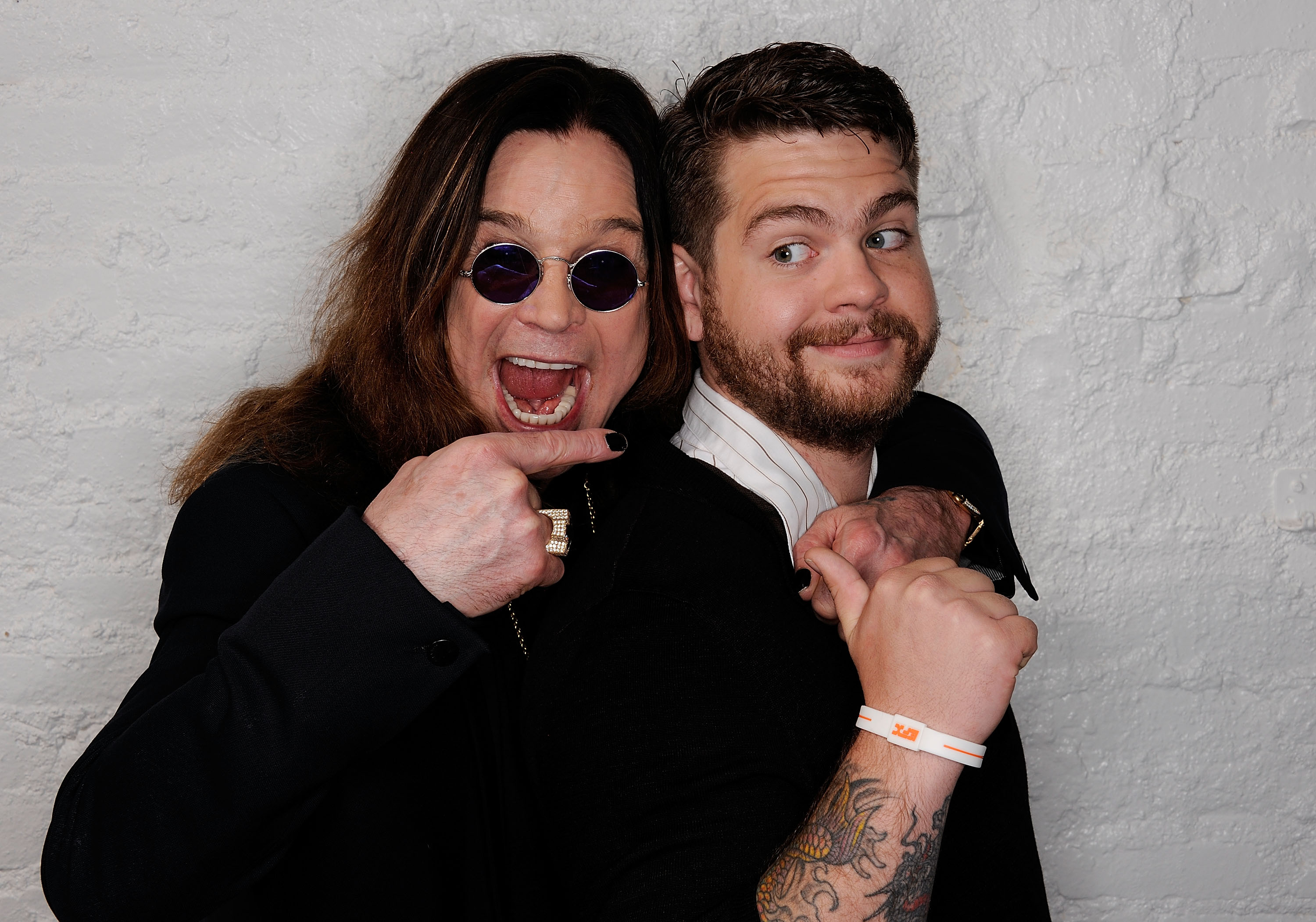 Jack Osbourne and his late father Ozzy Osbourne visit the Tribeca Film Festival portrait studio in New York City on April 25, 2011 | Source: Getty Images