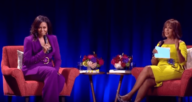 Michelle Obama and Gayle King on stage at the State Farm Arena, Atlanta, on May 11, 2019. | Source: YouTube/11Alive