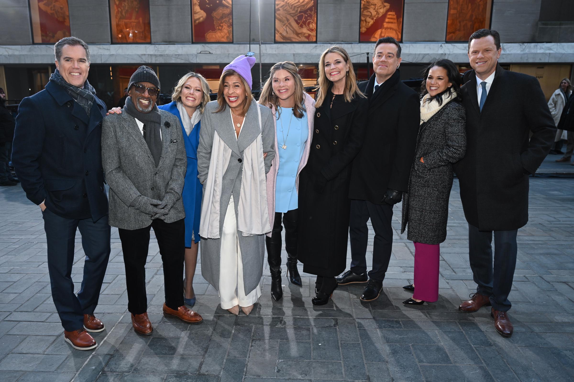 Peter Alexander, Al Roker, Dylan Dreyer, Hoda Kotb, Jenna Bush Hager, Savannah Guthrie, Carson Daly, Laura Jarrett and Willie Geist are seen at the NBC "Today" Show at Rockefeller Plaza on January 10, 2024, in New York City | Source: Getty Images