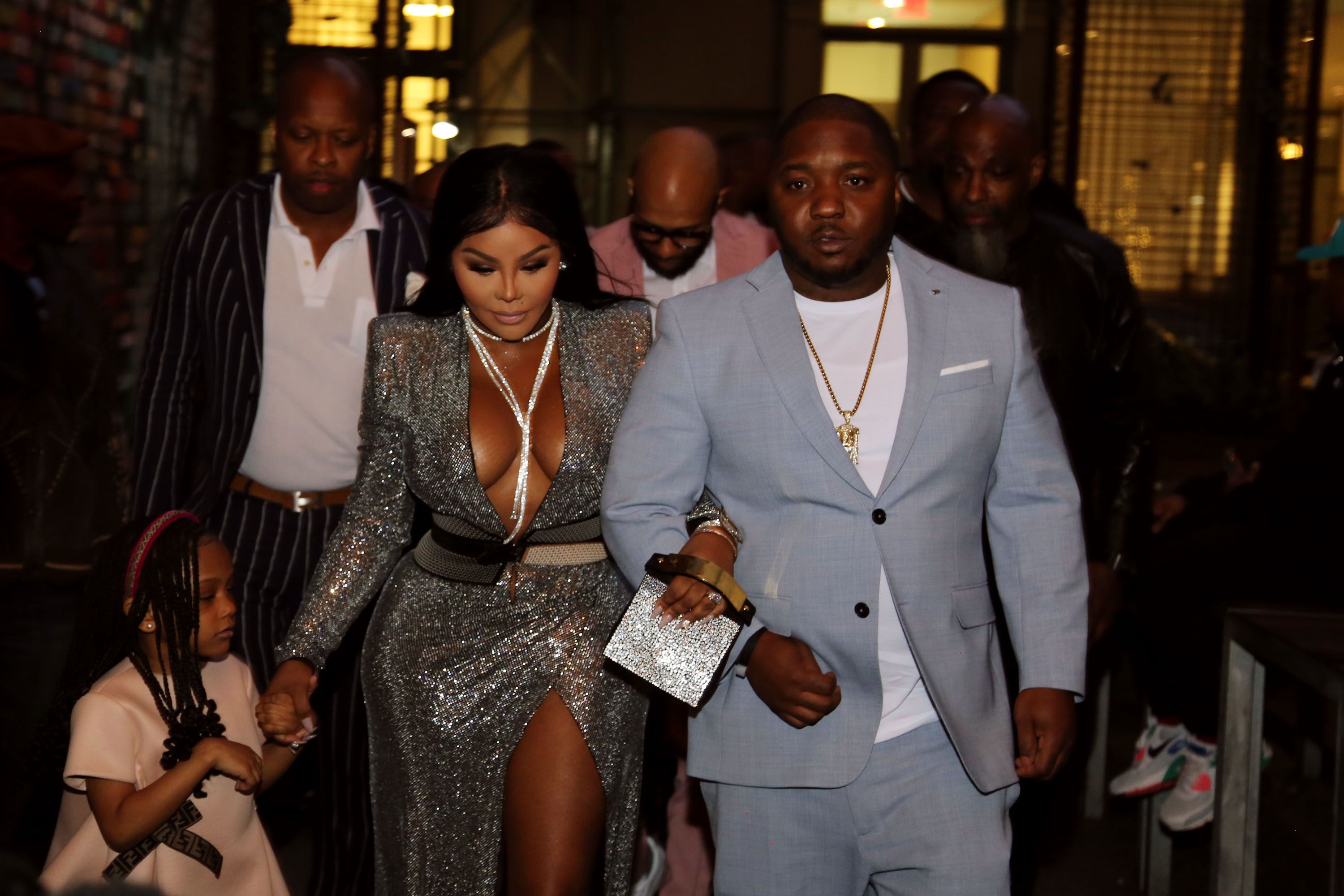 Lil' Kim with daughter Royal Reign and Lil' Cease at her 1st Annual B.I.G. Family Dinner in 2019 in New York City | Source: Getty Images