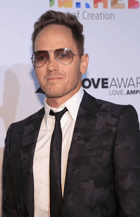 TobyMac poses on the red carpet after arriving at the 2016 Dove Awards at Allen Arena, on October 11, 2016, in Nashville, Tennessee | Source: Anna Webber/Getty Images for Dove Awards