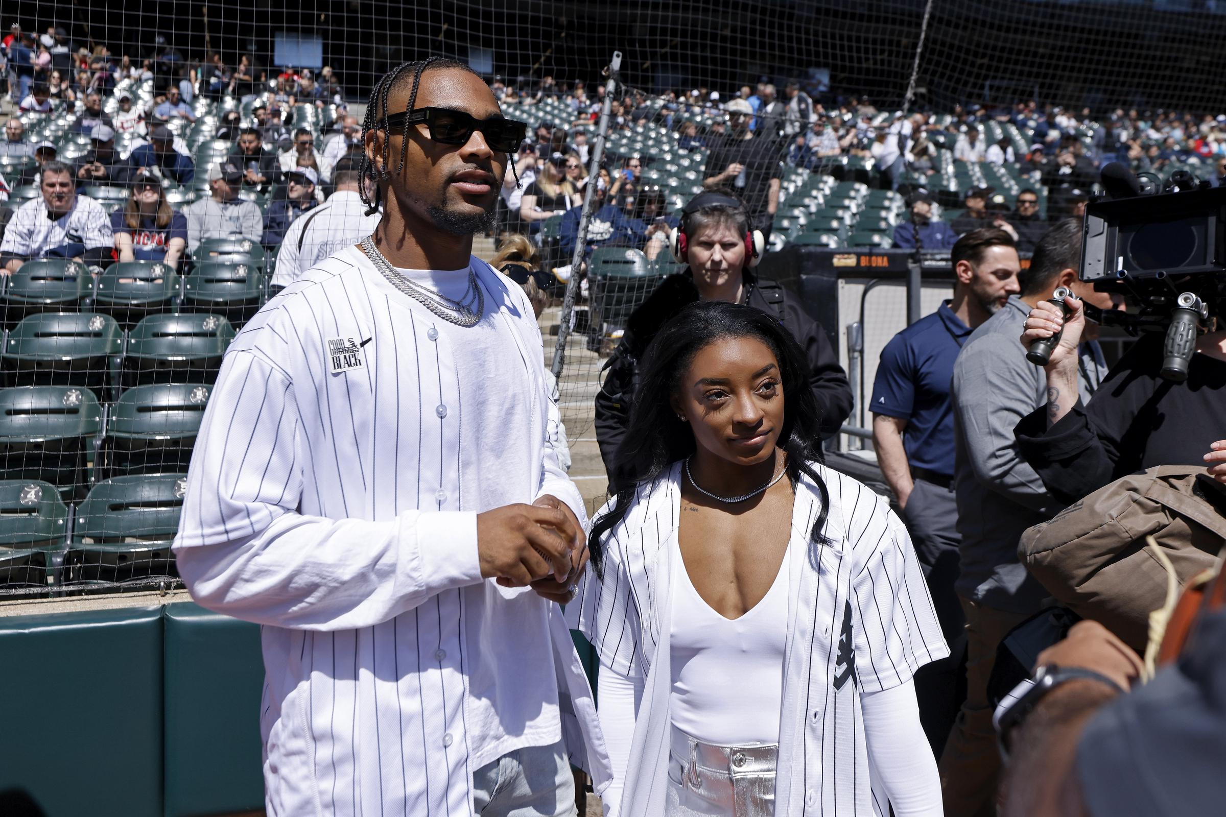 Jonathan Owens and Simone Biles attend the MLB game between the Chicago White Sox and the Cincinnati Reds at Guaranteed Rate Field in Chicago, Illinois on April 13, 2024 | Source: Getty Images