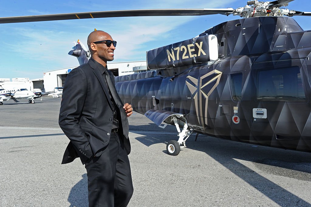 Kobe Bryant walking up to the Sikorsky S-76 helicopter on his way to his last game on April 13, 2016 | Getty Images