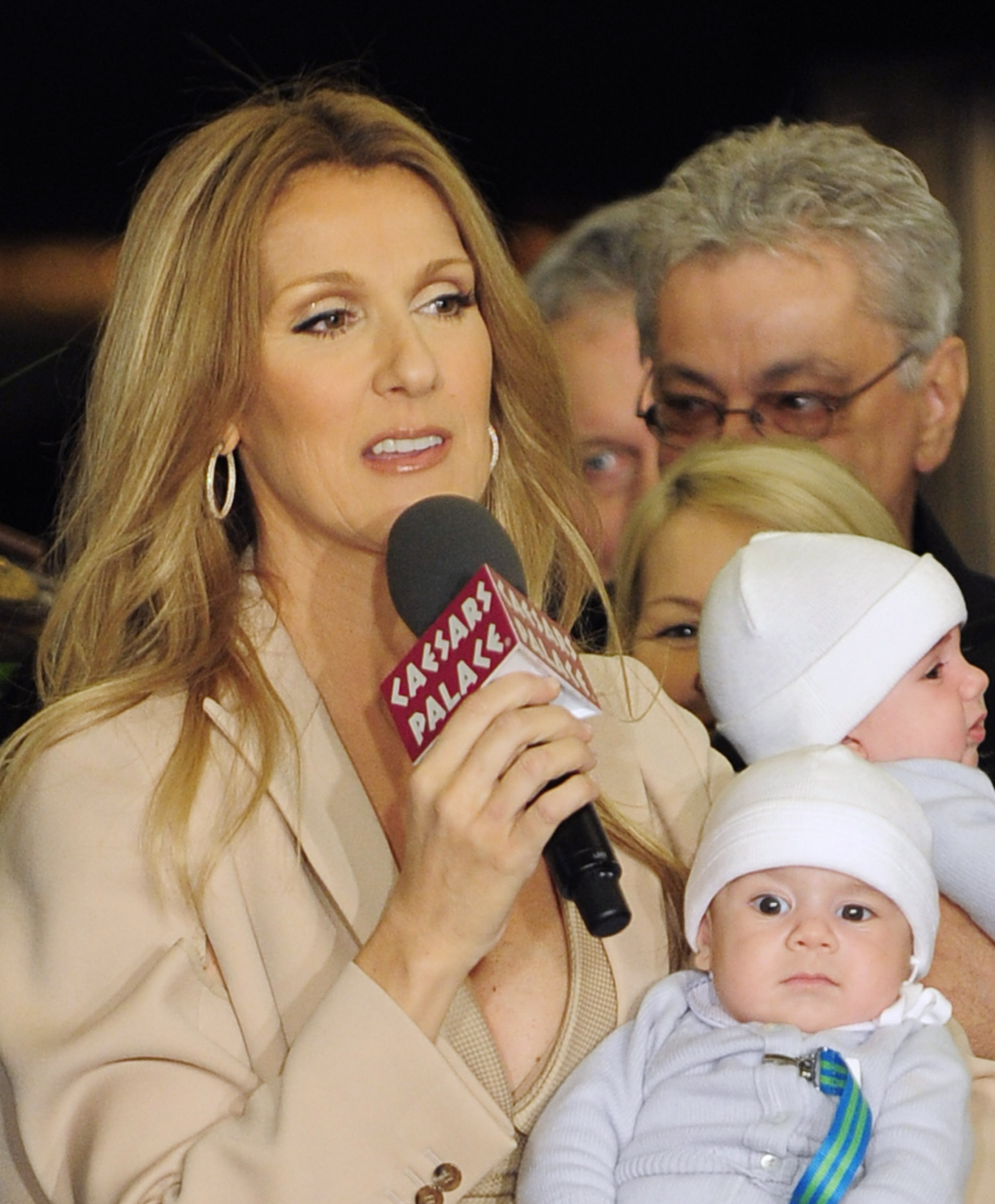 Celine Dion and her twins, Nelson and Eddy Angélil at Caesars Palace in Las Vegas, 2011 | Source: Getty Images