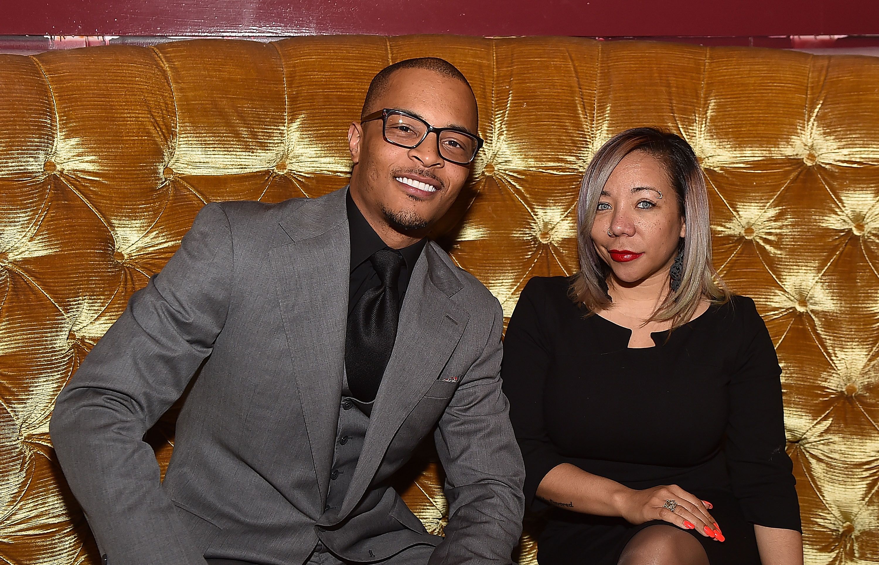 Rapper Clifford "T.I." Harris and Tameka "Tiny" Harris at the Scales 925 Restaurant ribbon cutting ceremony on March 27, 2015 | Photo: Getty Images